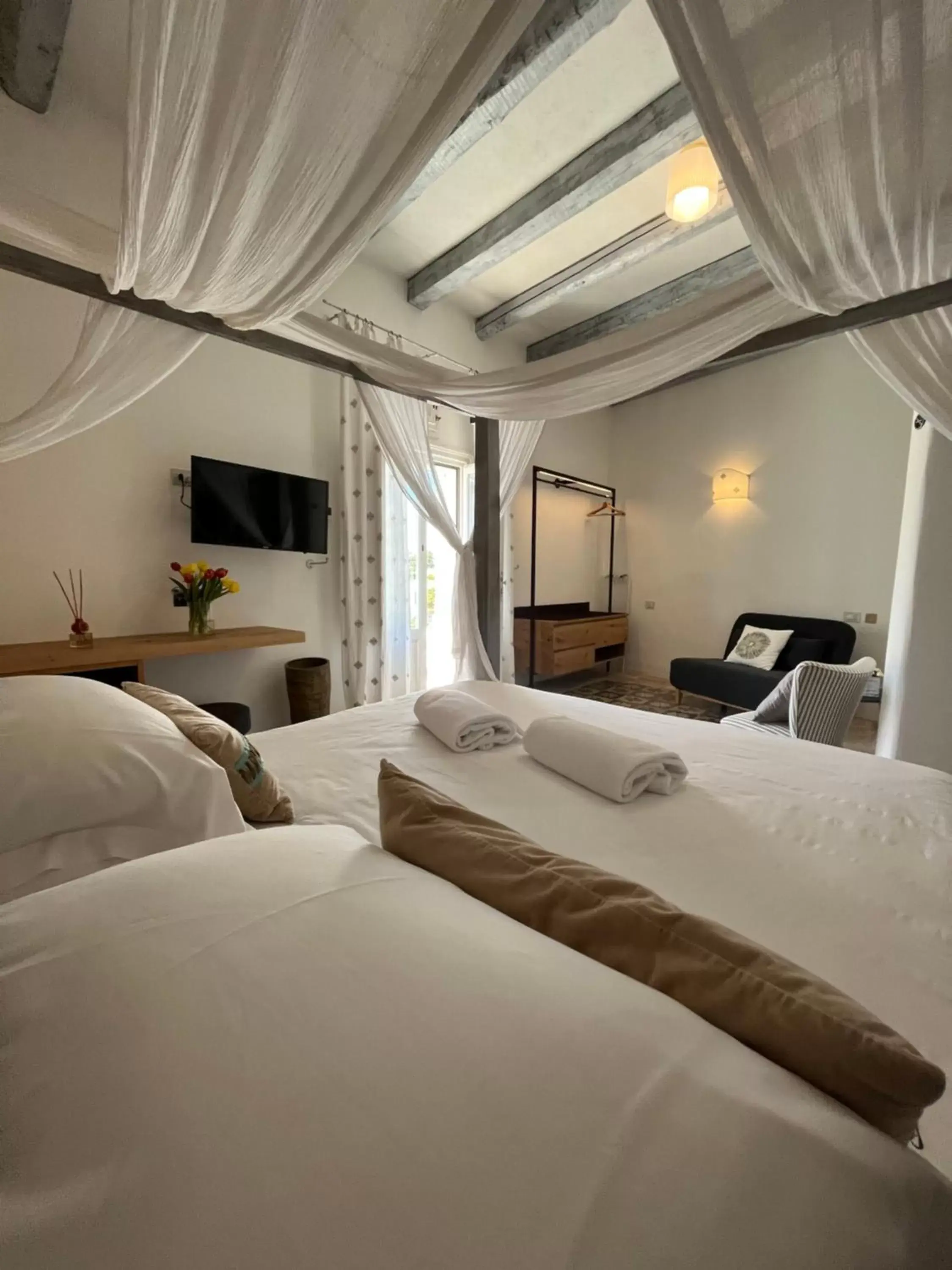 Bed in Antico Mondo Rooms & Suites