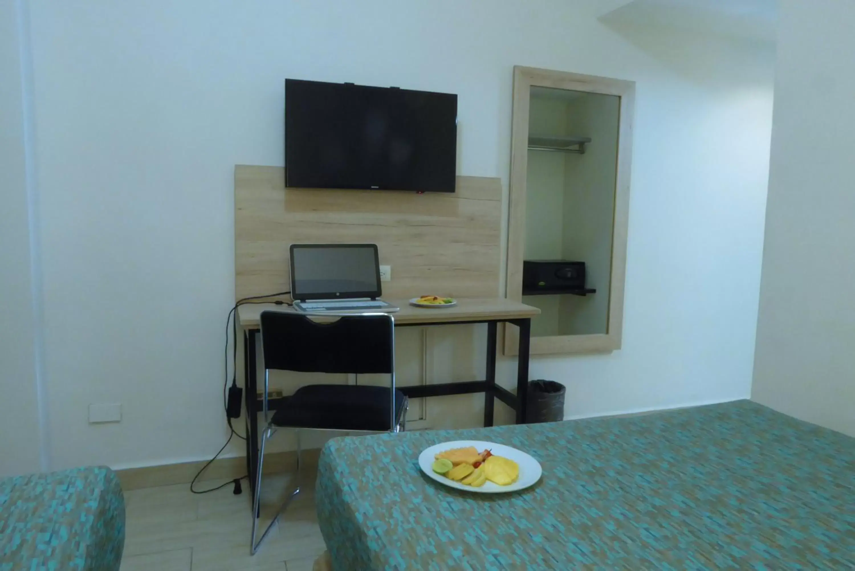 TV/Entertainment Center in Hotel Son- Mar Monterrey Centro