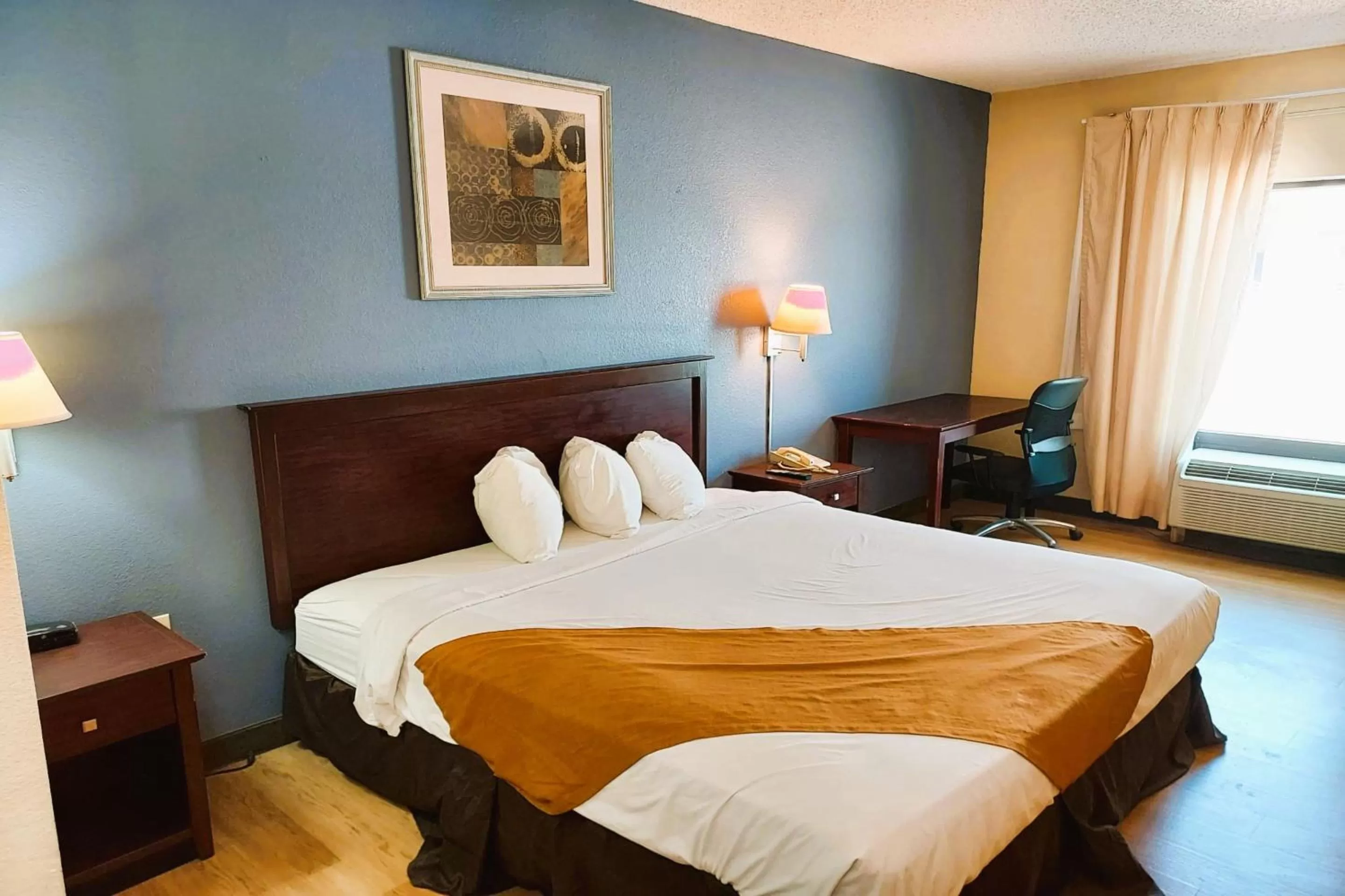 Bedroom, Bed in McPherson Inn By OYO, I-135