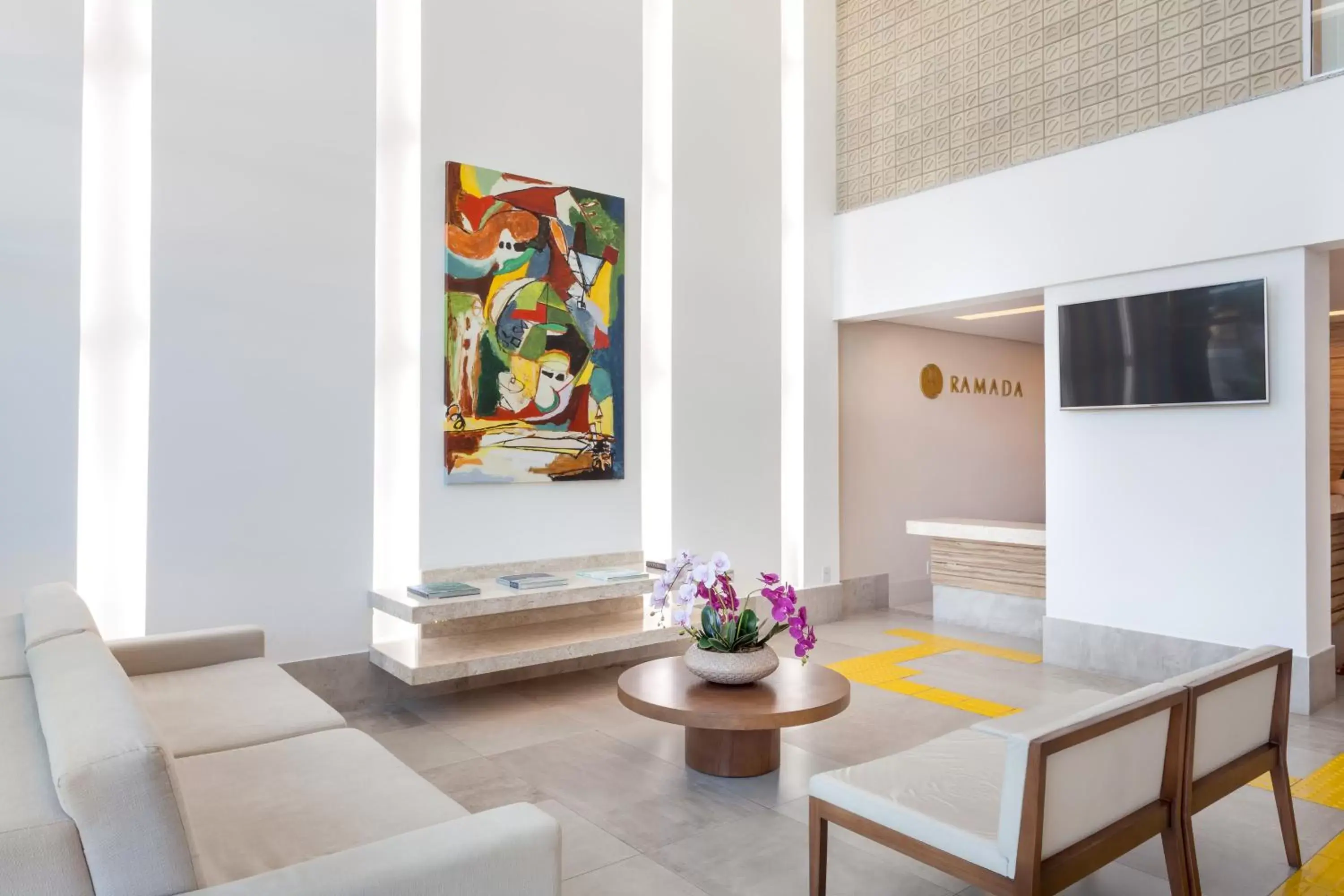 Lobby or reception in Ramada by Wyndham Macae Hotel & Suites Lobby or reception in Ramada by Wyndham Macae Hotel & Suites