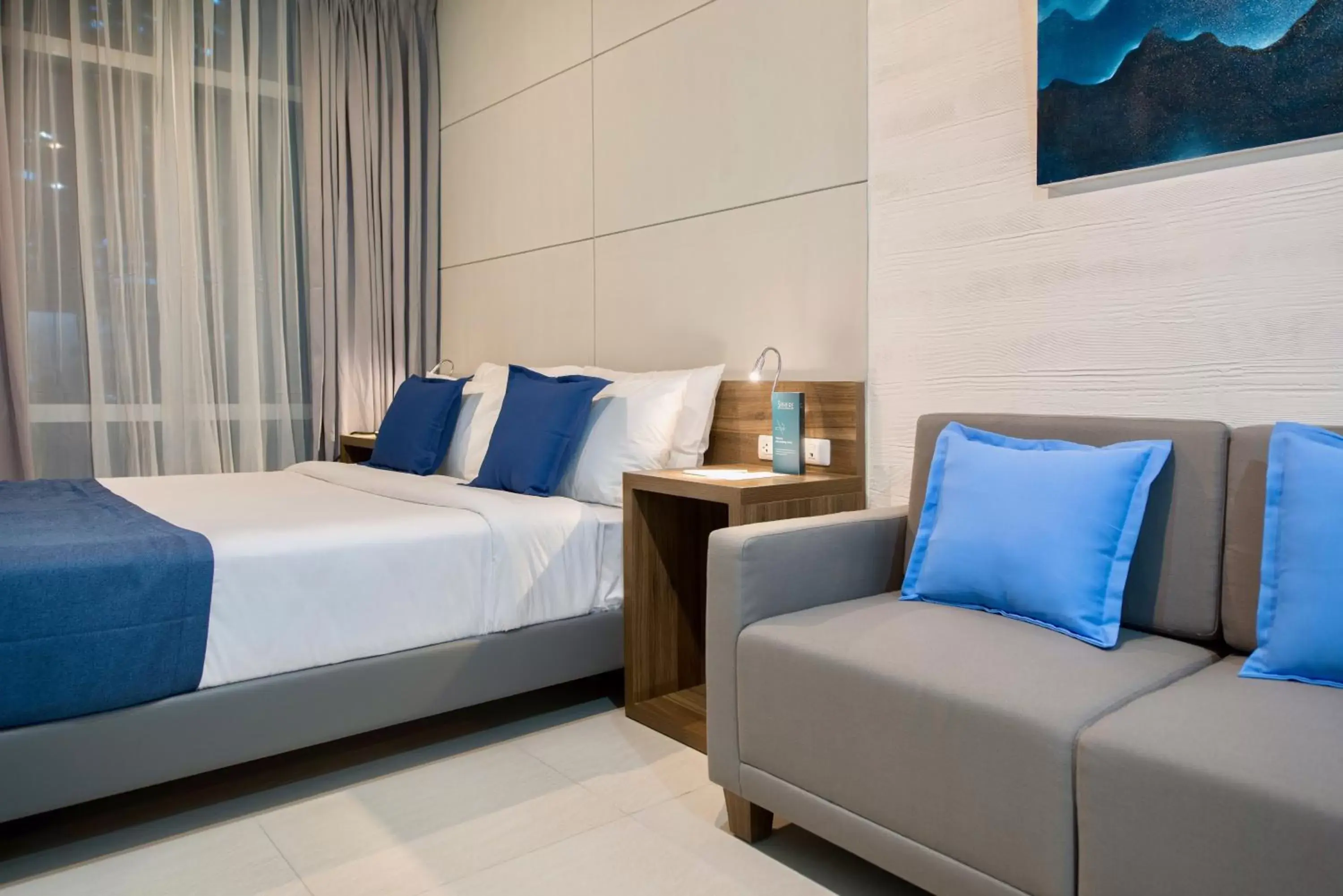 Bed in The Sphere Serviced Residences Managed by HII