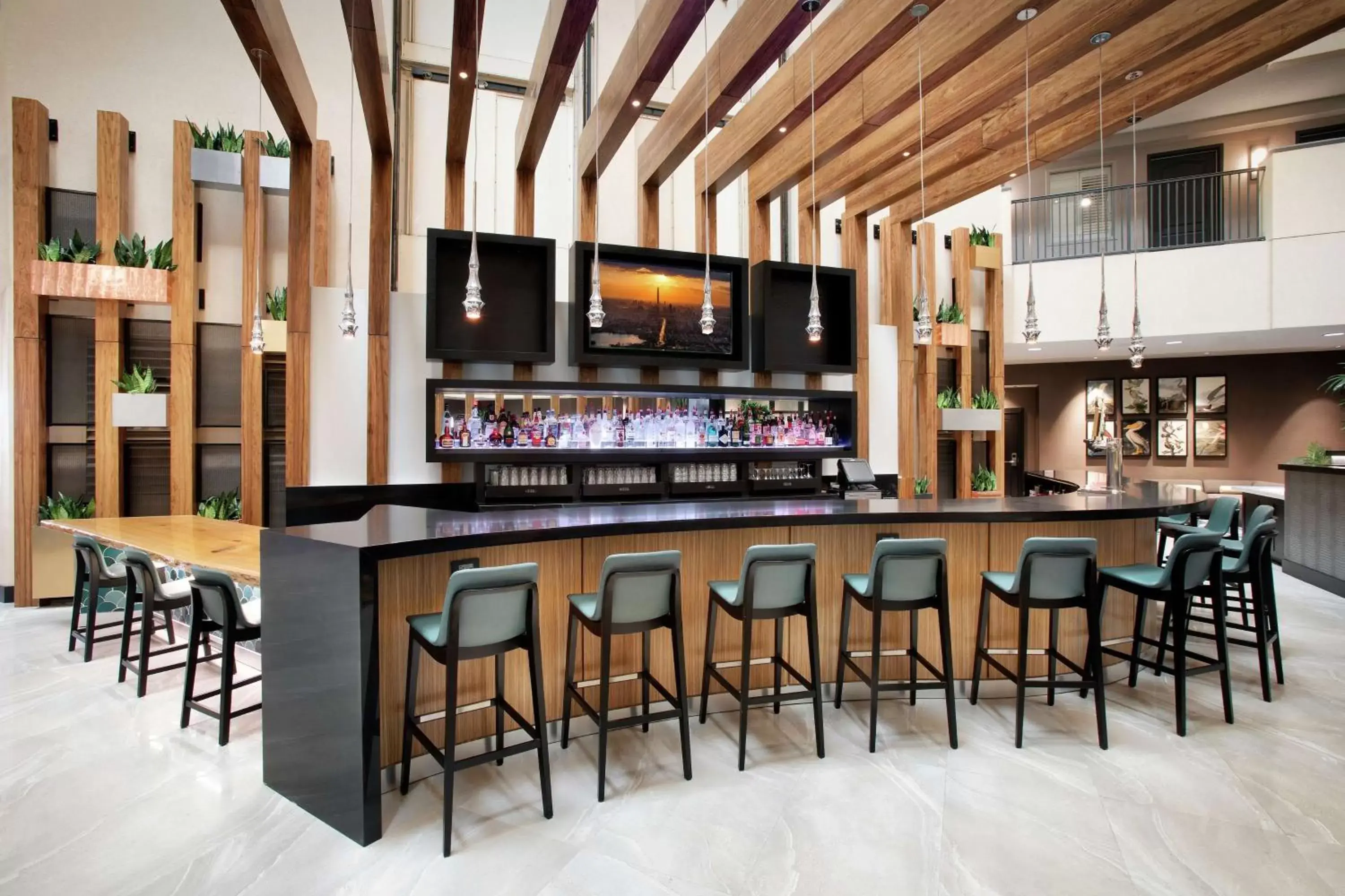 Lounge or bar in Embassy Suites by Hilton Orlando Airport Lounge or bar in Embassy Suites by Hilton Orlando Airport