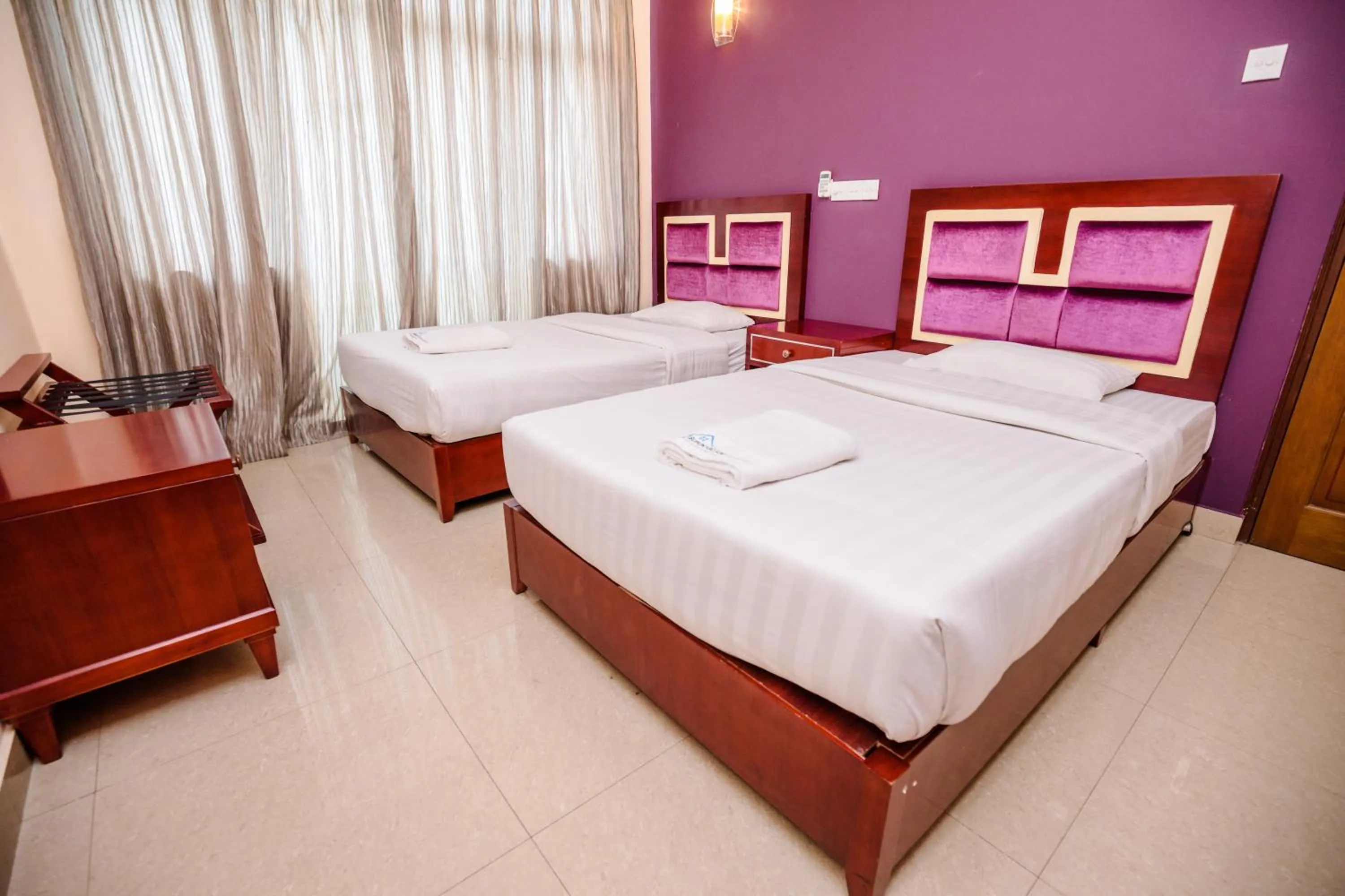 Photo of the whole room, Bed in Supun Arcade Residency