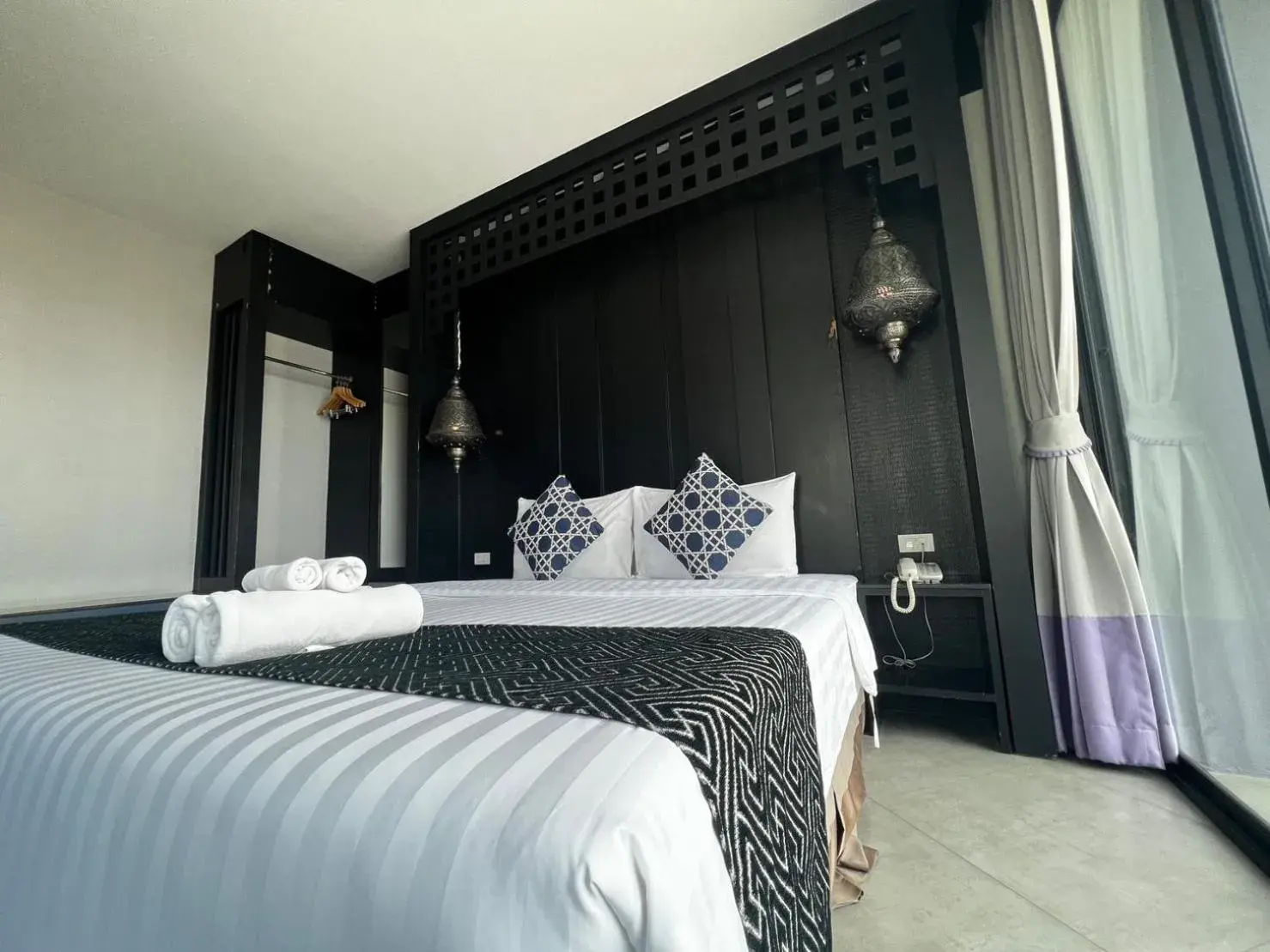 Bed in Srisawara Casa Hotel