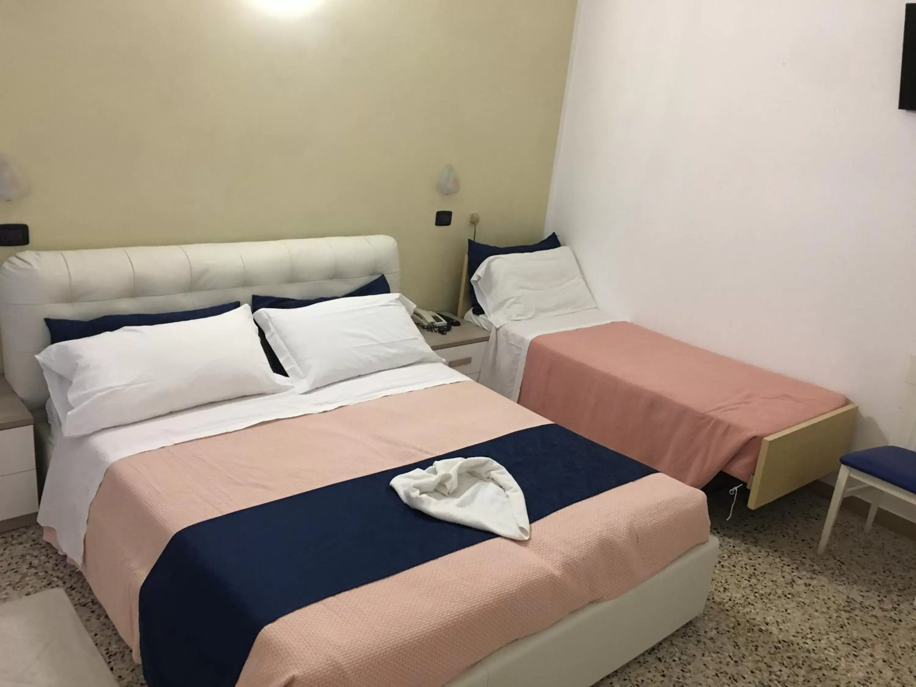 Bed in Dea Della Salute Hotel