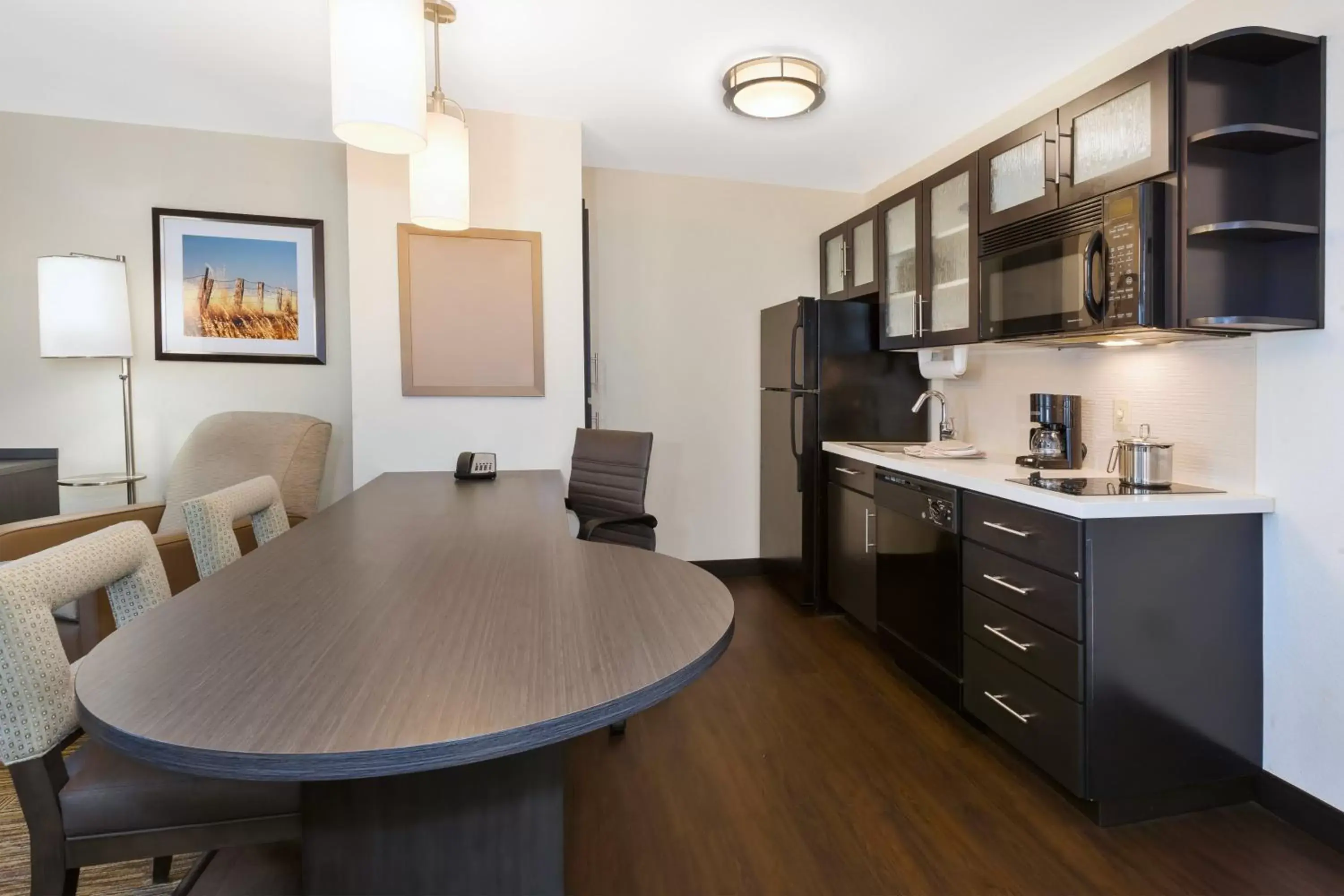 Photo of the whole room, Kitchen/Kitchenette in Candlewood Suites Polaris, an IHG Hotel