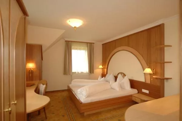 Bed in Hotel Neuwirt