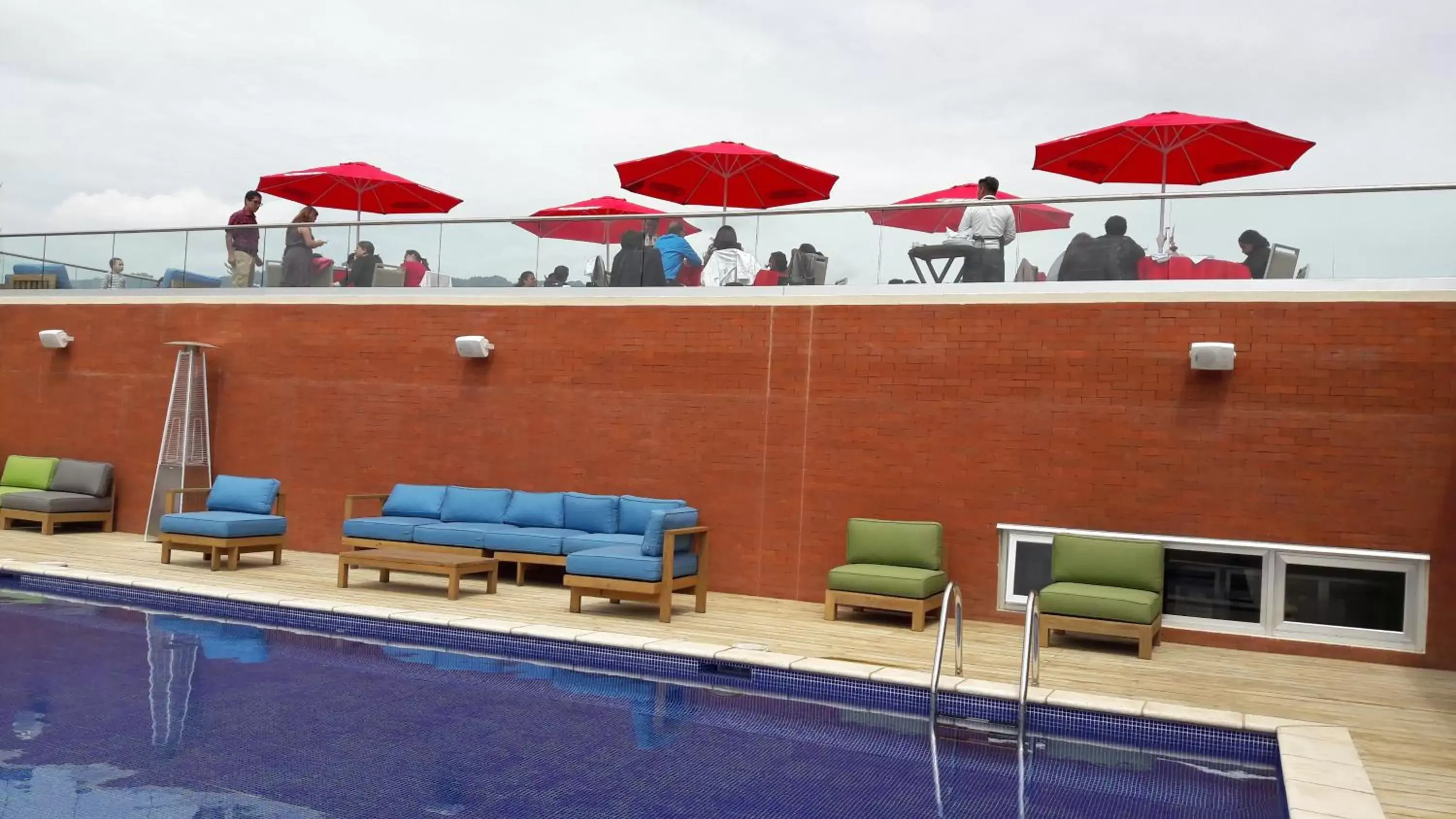 Balcony/Terrace, Swimming Pool in LATAM HOTEL Plaza Pradera Quetzaltenango