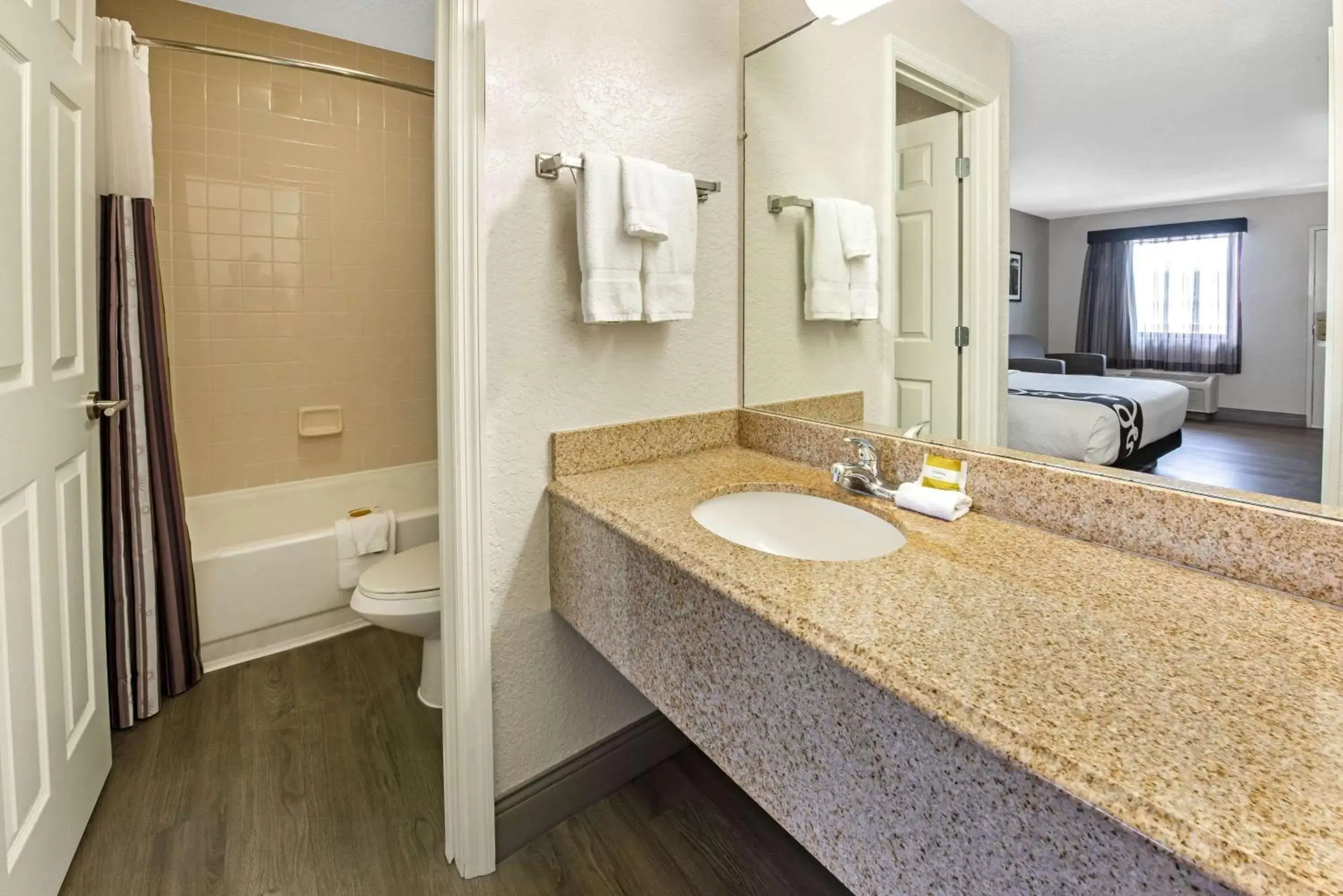 Bathroom in La Quinta Inn by Wyndham West Palm Beach - Florida Turnpike