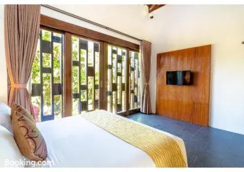 Bed in The Canggu Boutique Villas and Spa