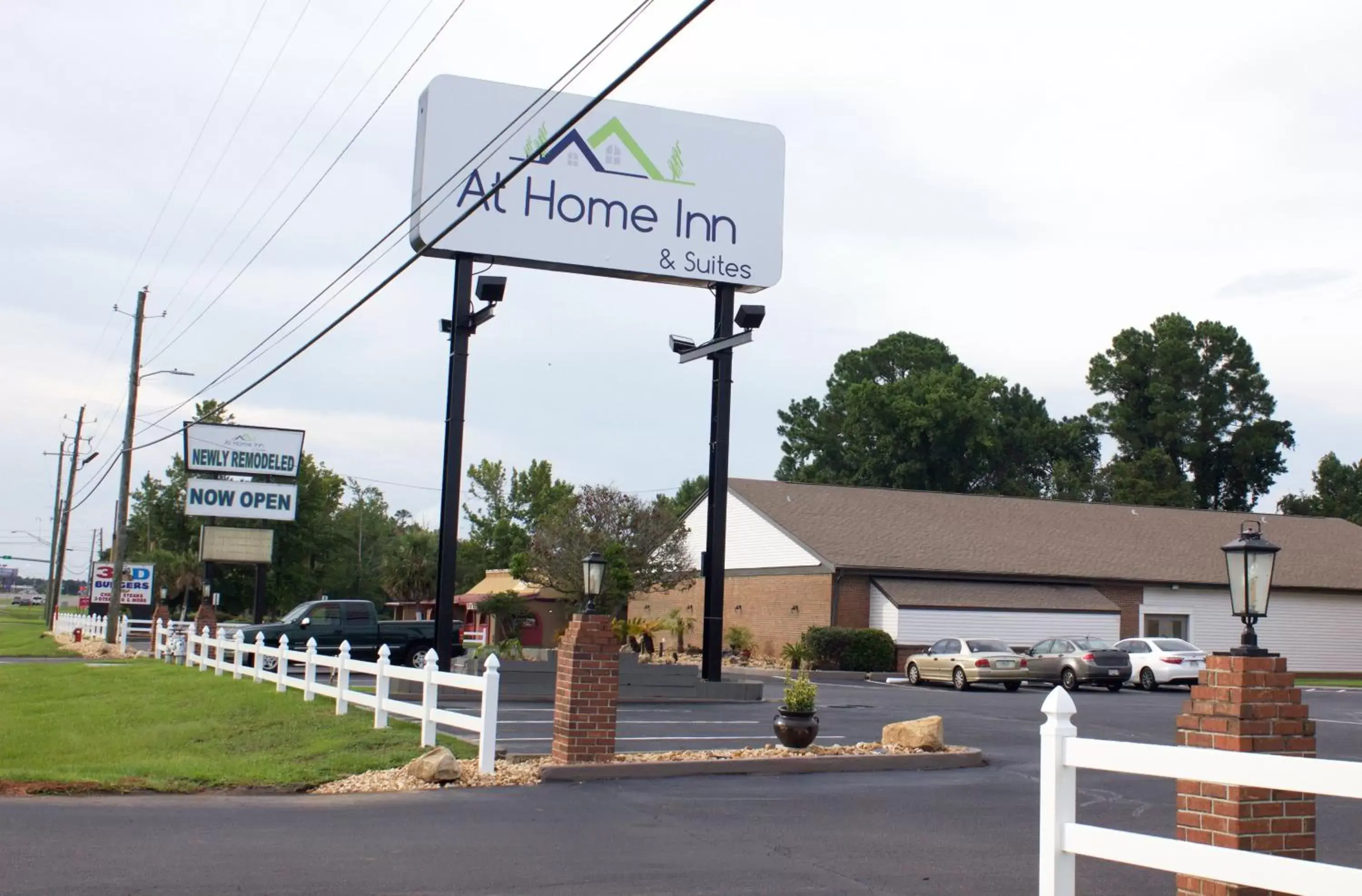 Facade/entrance, Property Building in At Home Inn & Suites