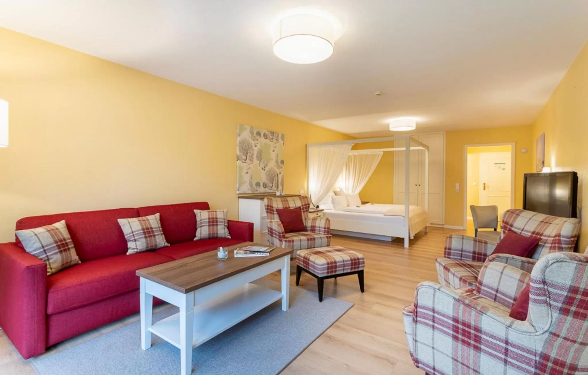 Seating area, Bed in Hotel Landhaus Ellerbrock