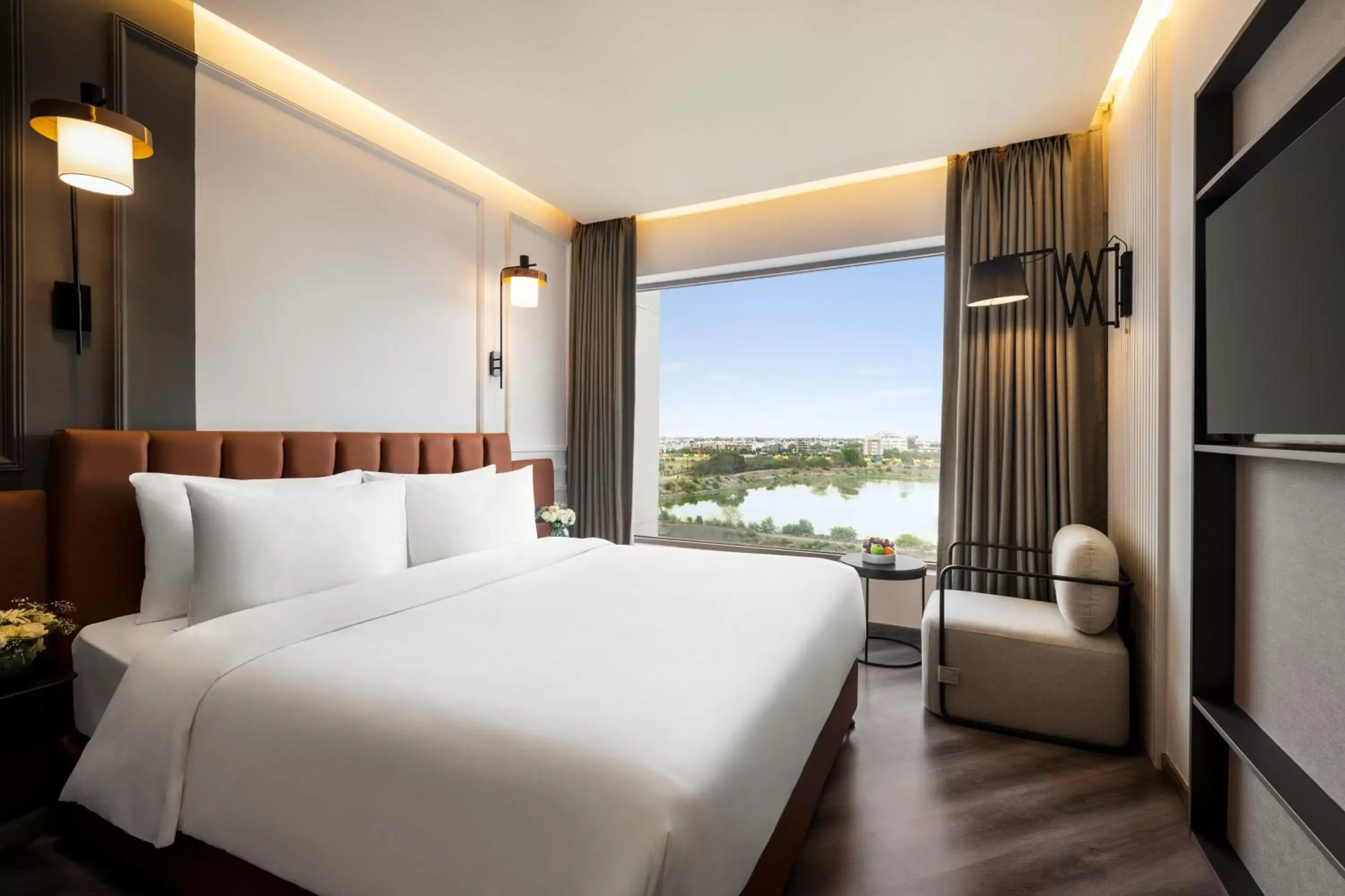 Bed in Ramada Encore by Wyndham Indore Nipania