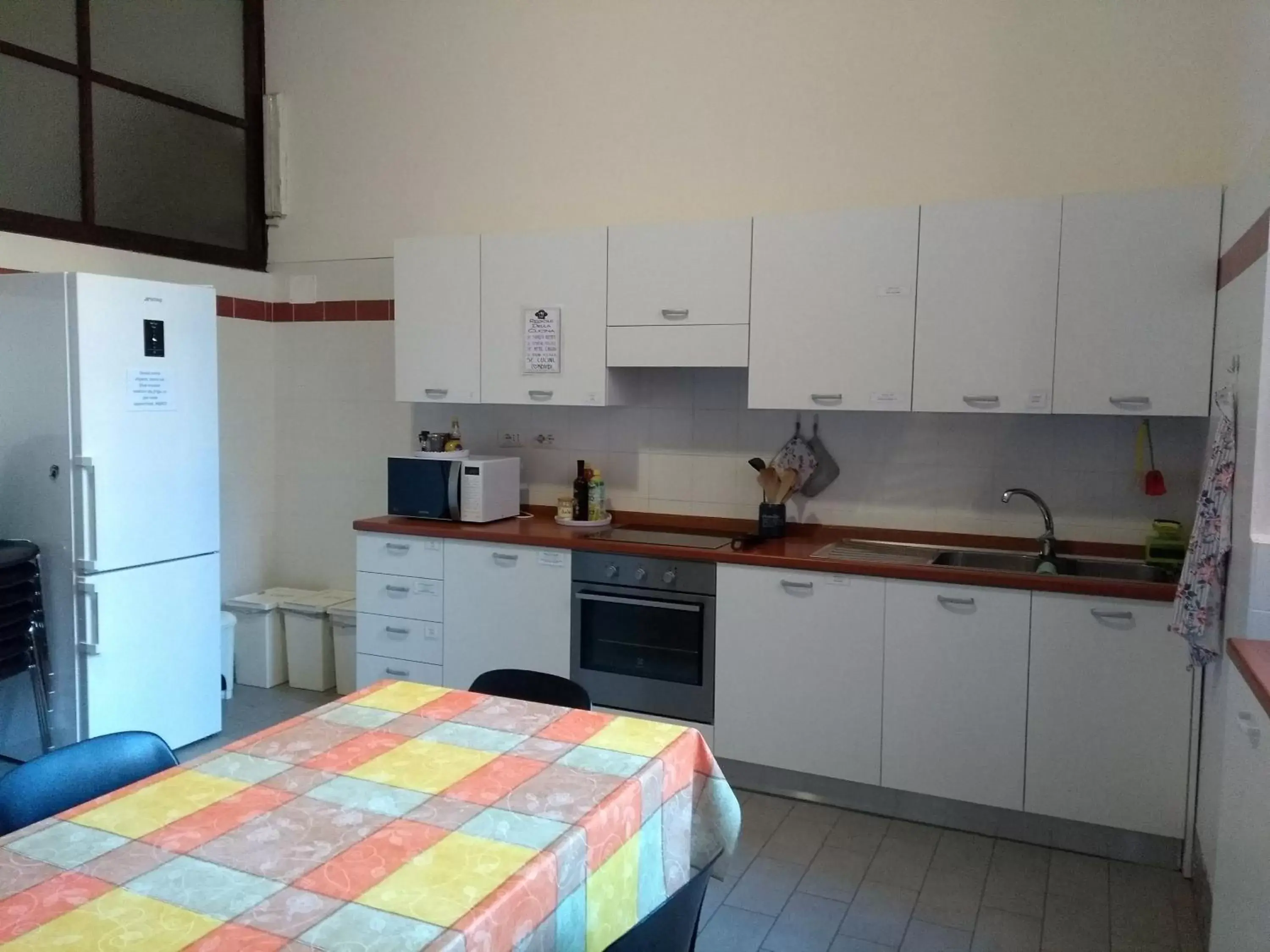 Communal kitchen, Kitchen/Kitchenette in Casa S. Giuseppe di Cluny