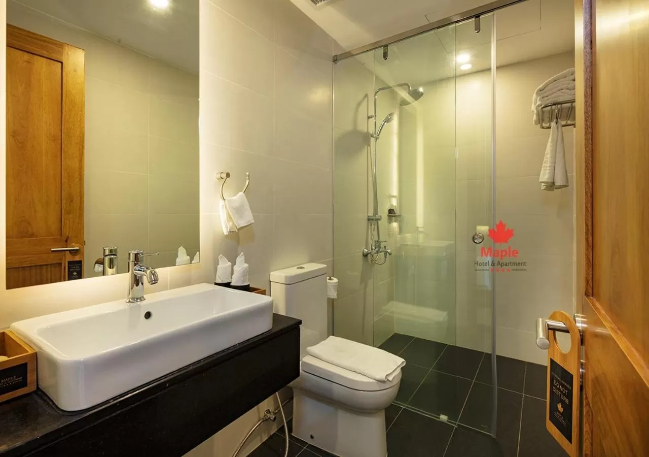 Toilet in Maple Hotel & Apartment