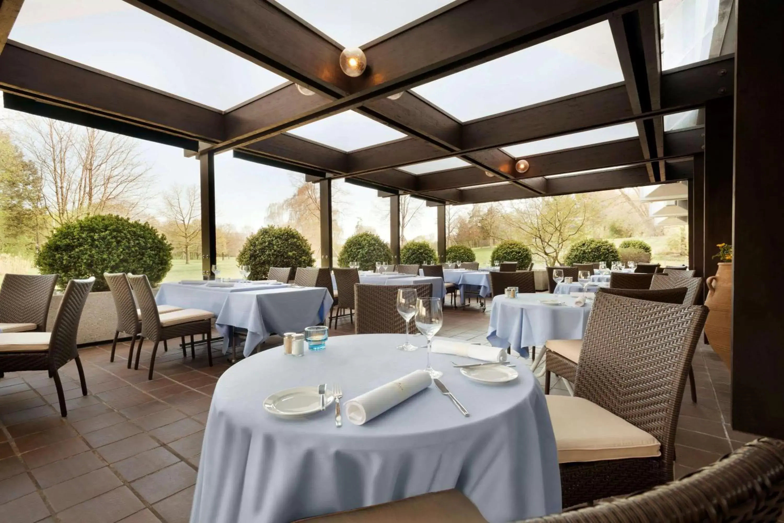 Patio, Restaurant/Places to Eat in Ramada Nuernberg Parkhotel