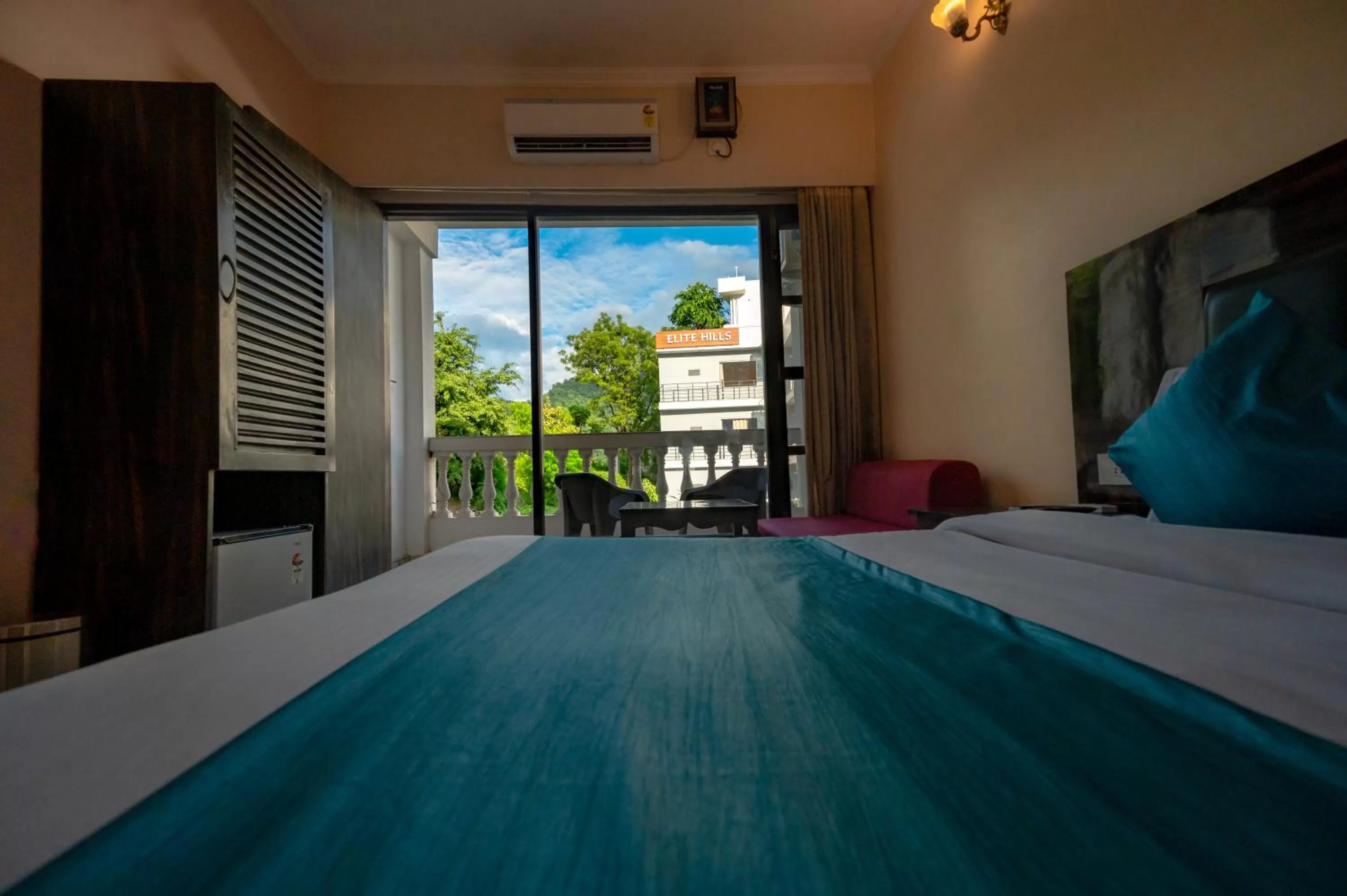 Photo of the whole room, Bed in Hotel Rishikesh Grand by Kool Stays