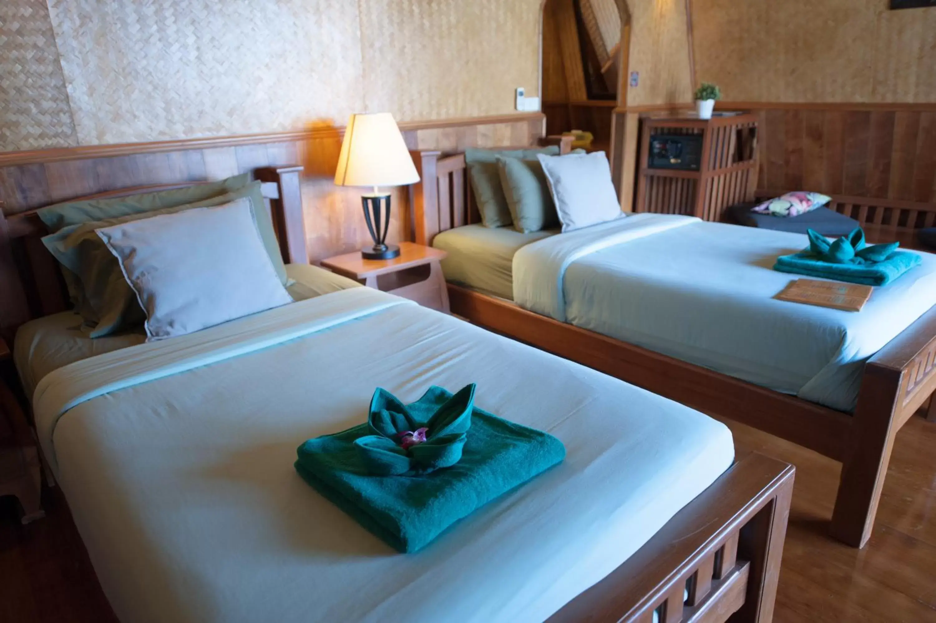 Bed in Koh Kood Beach Resort