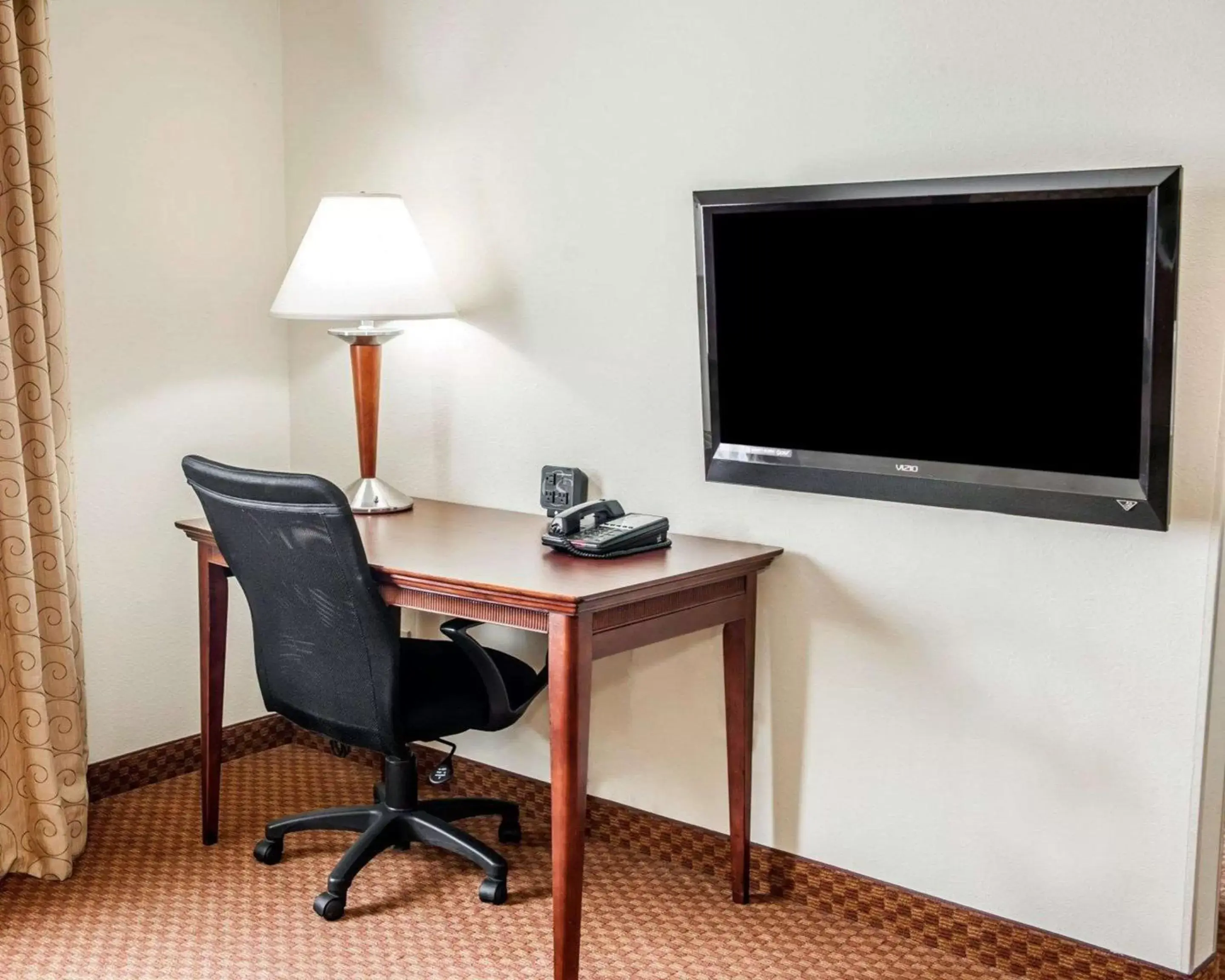 Photo of the whole room, TV/Entertainment Center in Comfort Suites near Indianapolis Airport