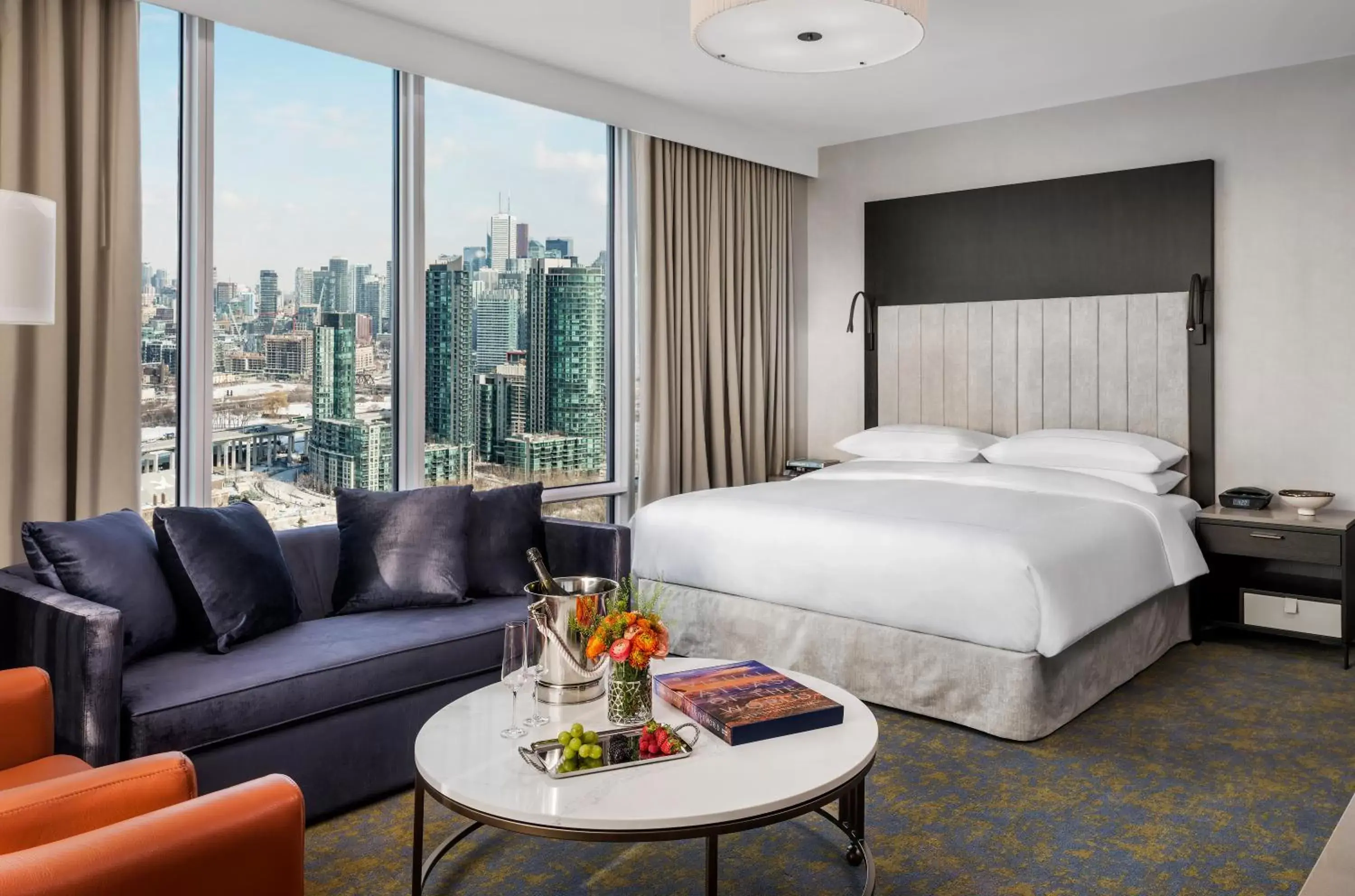 Seating area in Hotel X Toronto by Library Hotel Collection