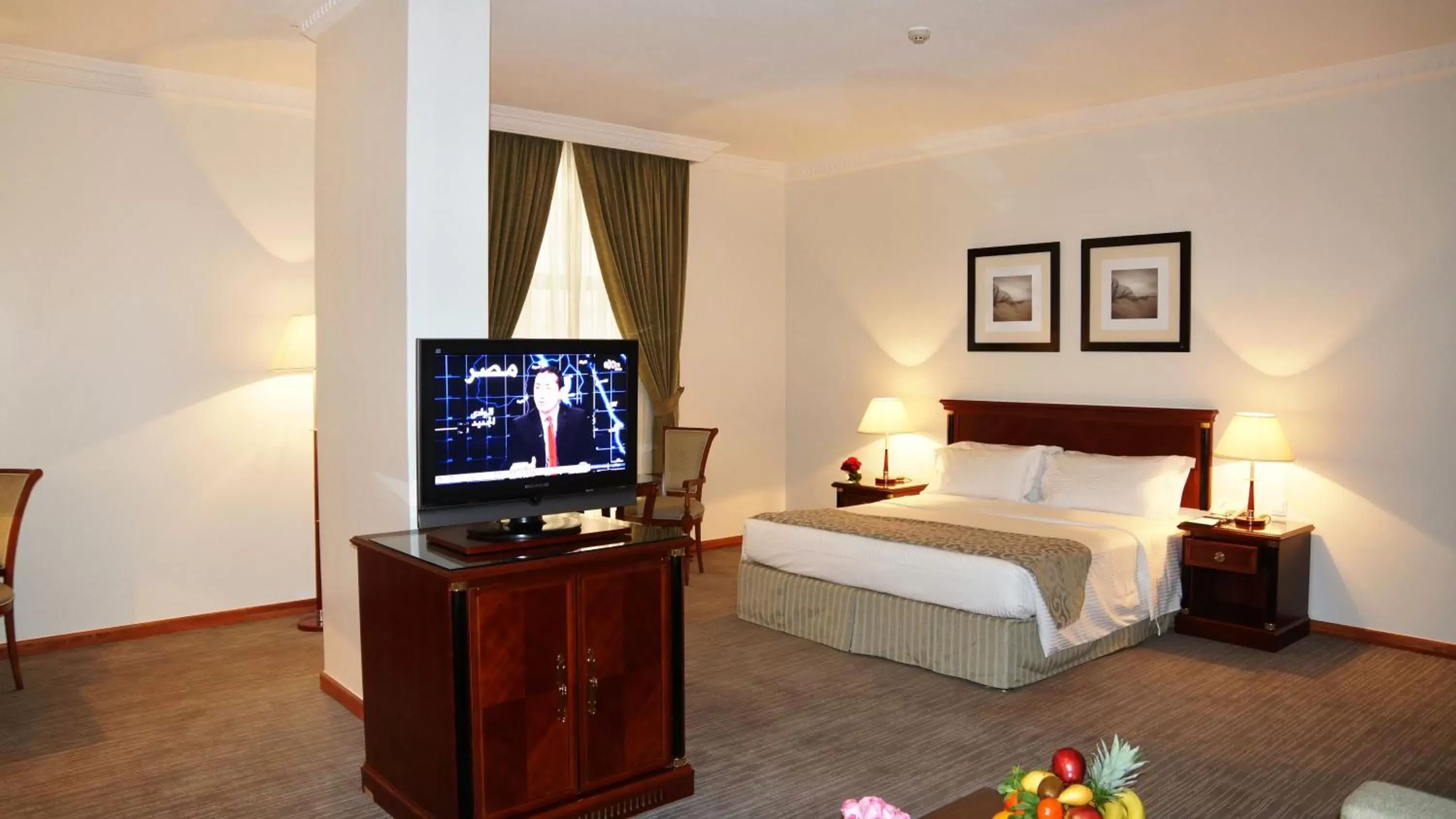 Bed, TV/Entertainment Center in Executives Hotel - Olaya