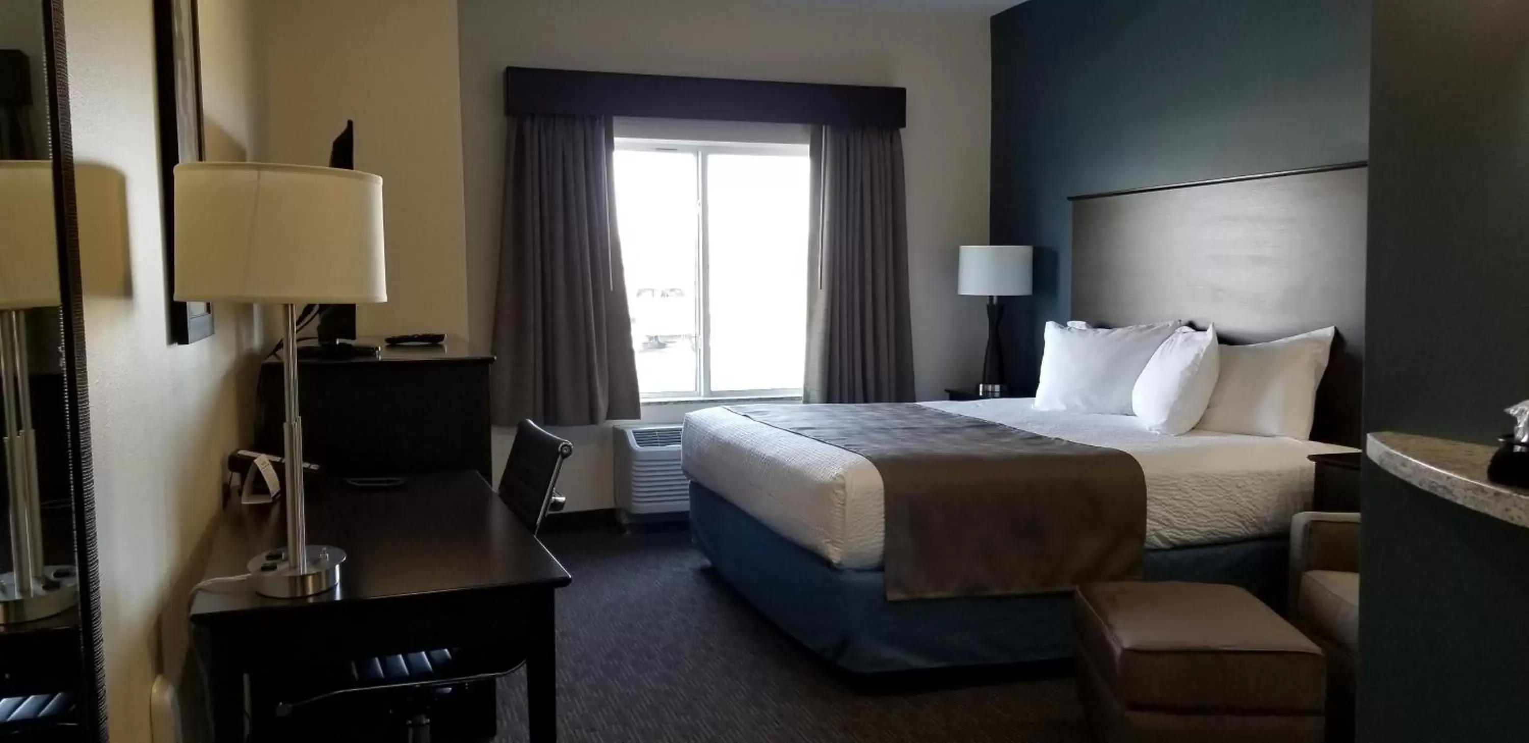 Bed in AmericInn by Wyndham Sioux Falls North