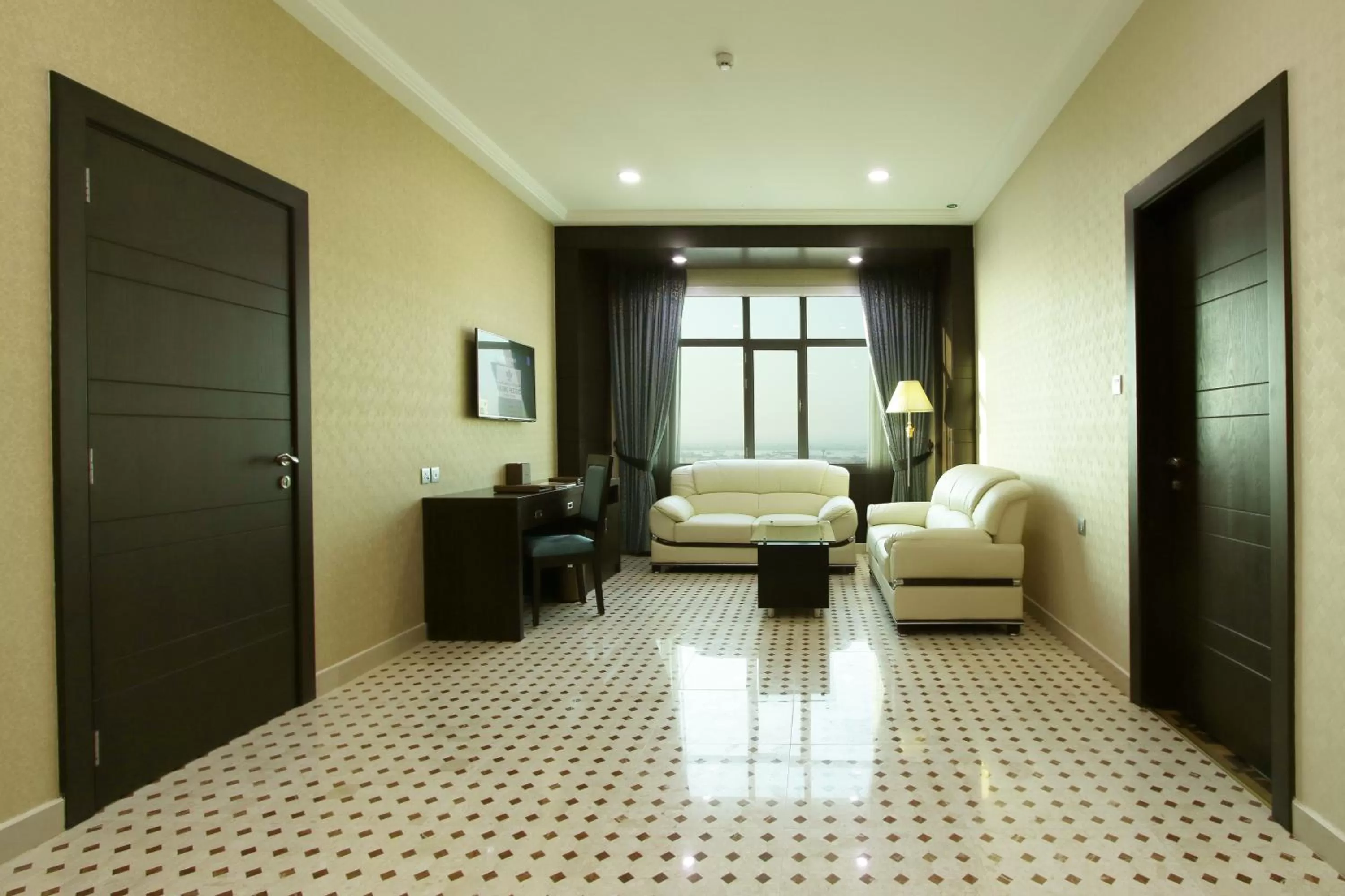 Living room in Park Regis Lotus Hotel