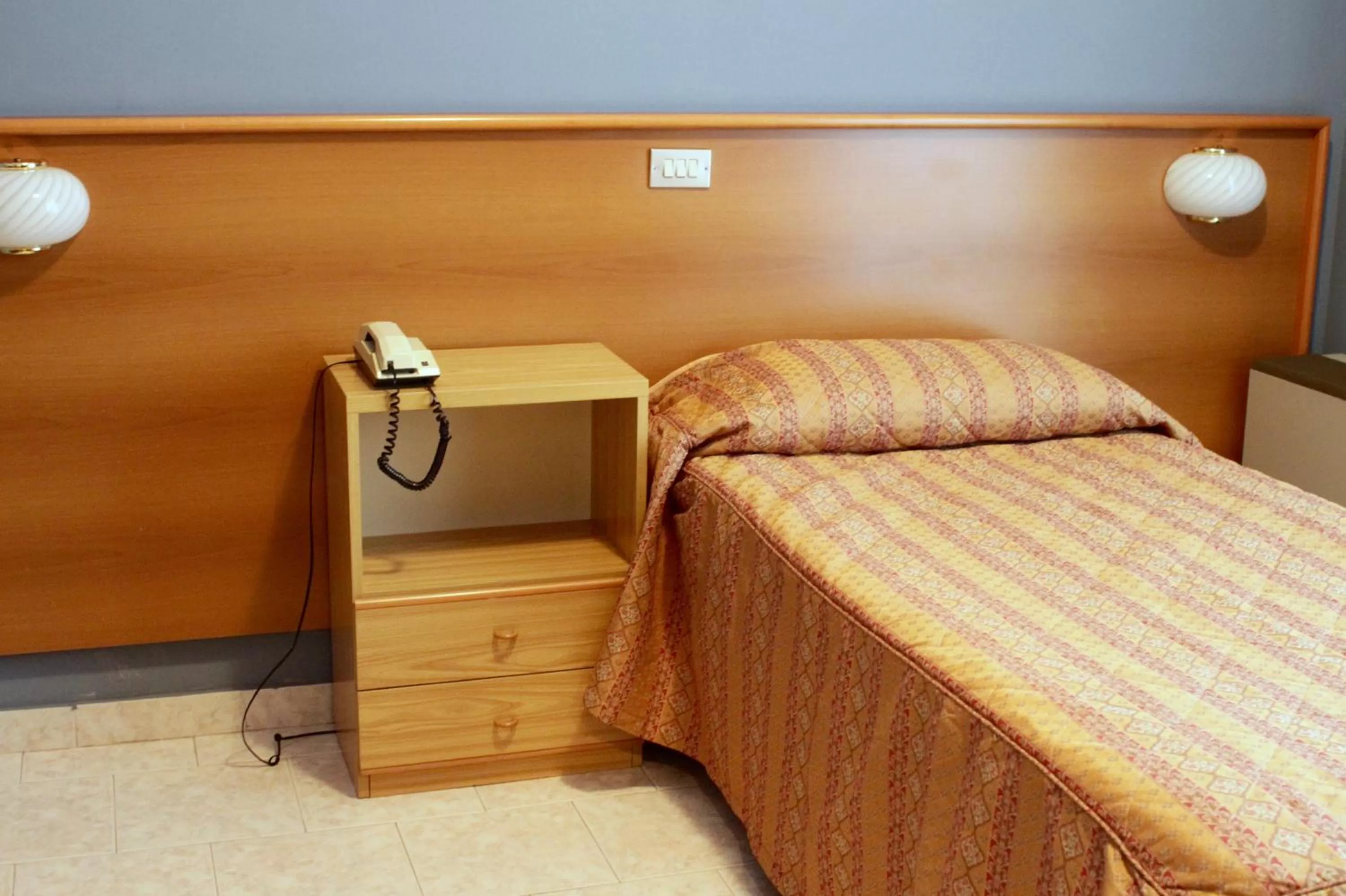 Bed in Hotel Monumento