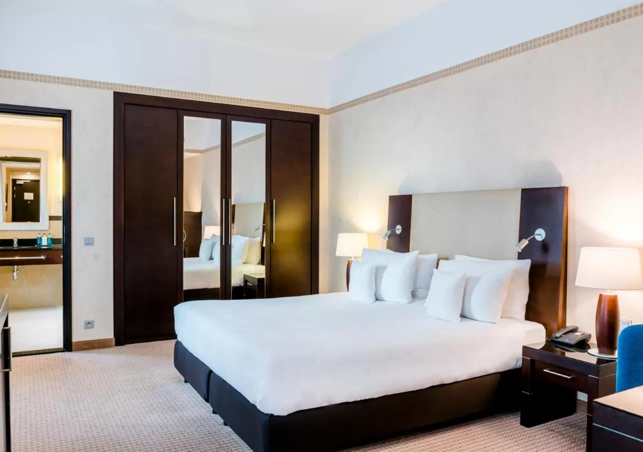 Bed in Hotel Polonia Palace