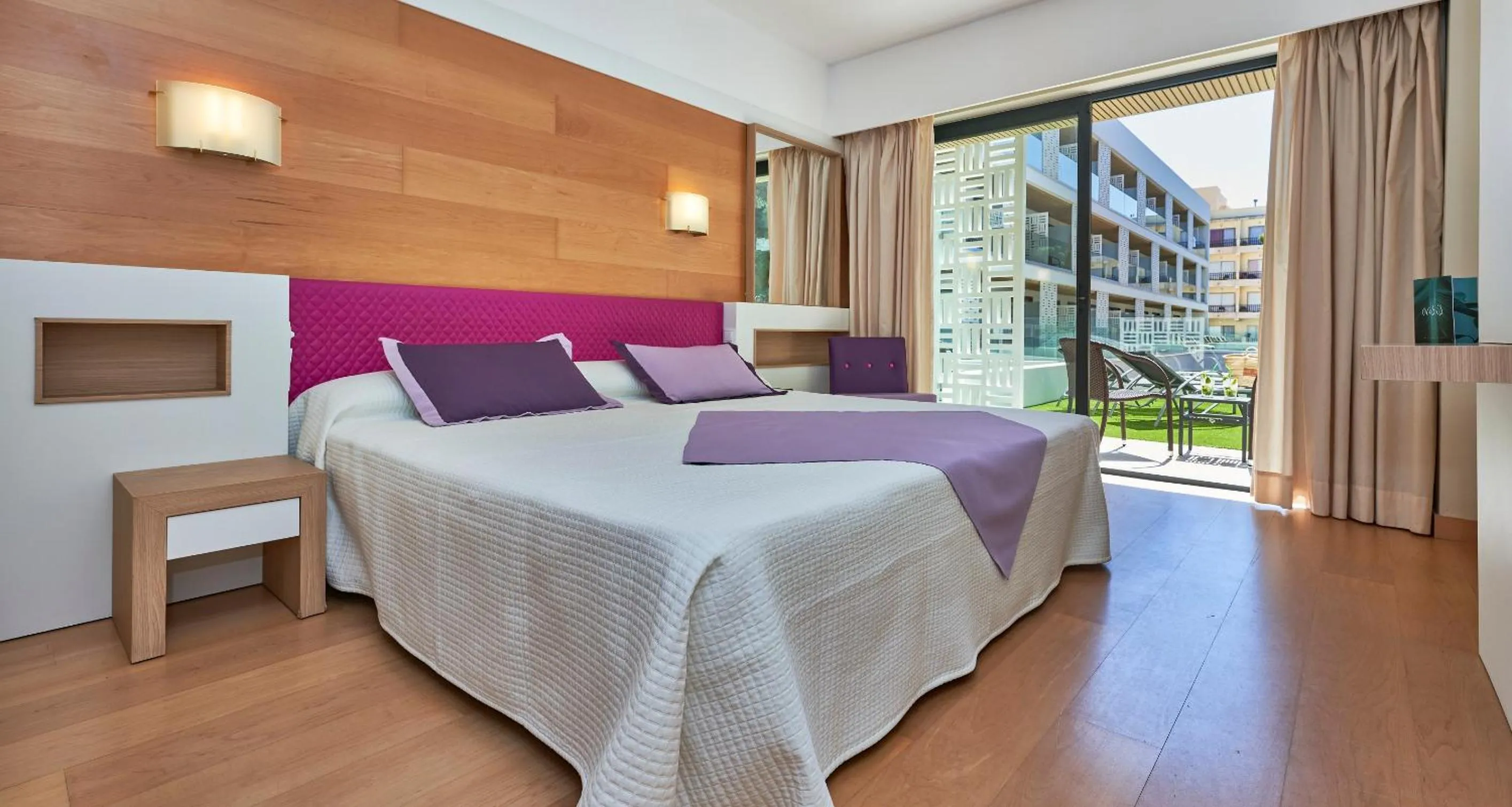 Photo of the whole room, Bed in Hotel & Spa S'Entrador Playa