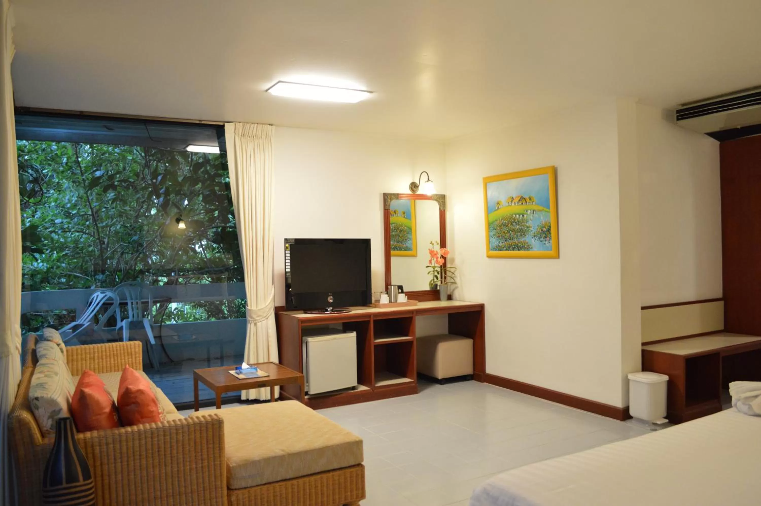 Seating area, Bed in Nern Chalet Beachfront Hotel