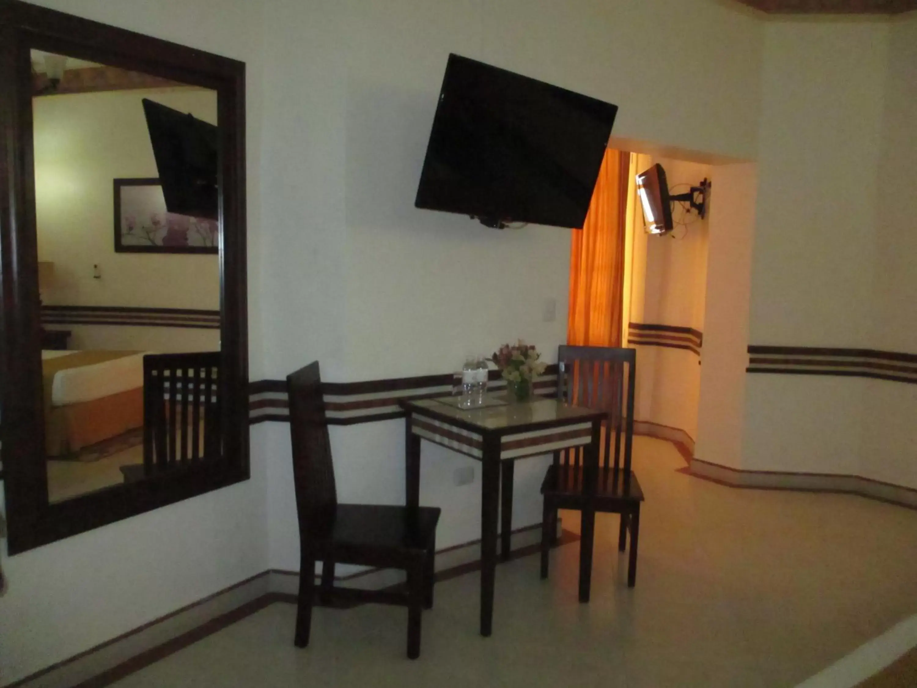 Seating area, TV/Entertainment Center in Centro Hotel Villa las Margaritas