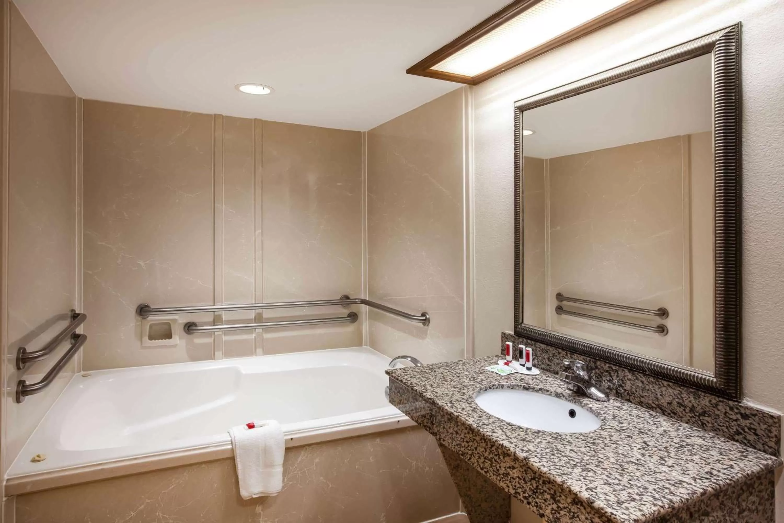 Bathroom in Days Inn & Suites by Wyndham Tyler