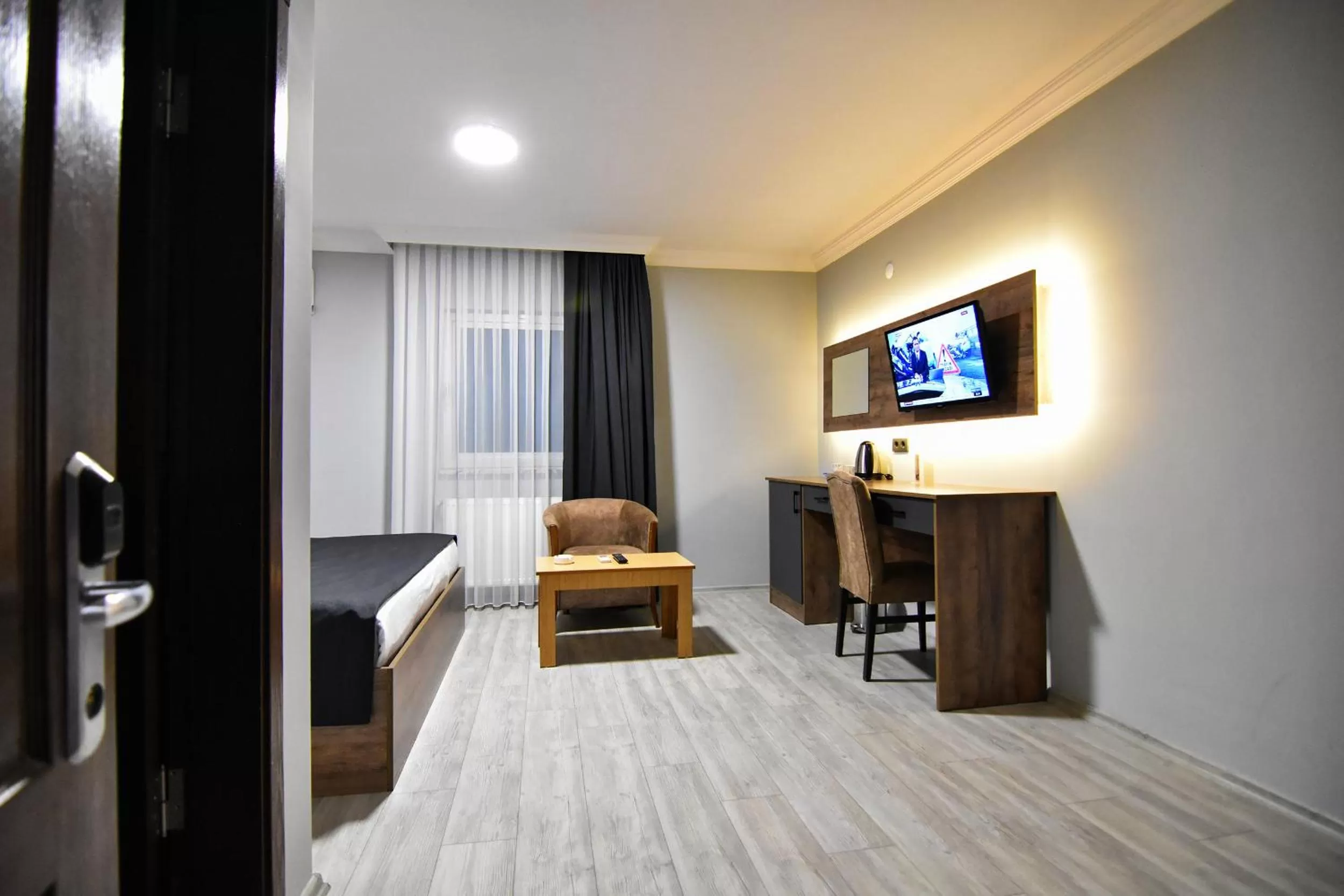 TV and multimedia, TV/Entertainment Center in Sandal Otel