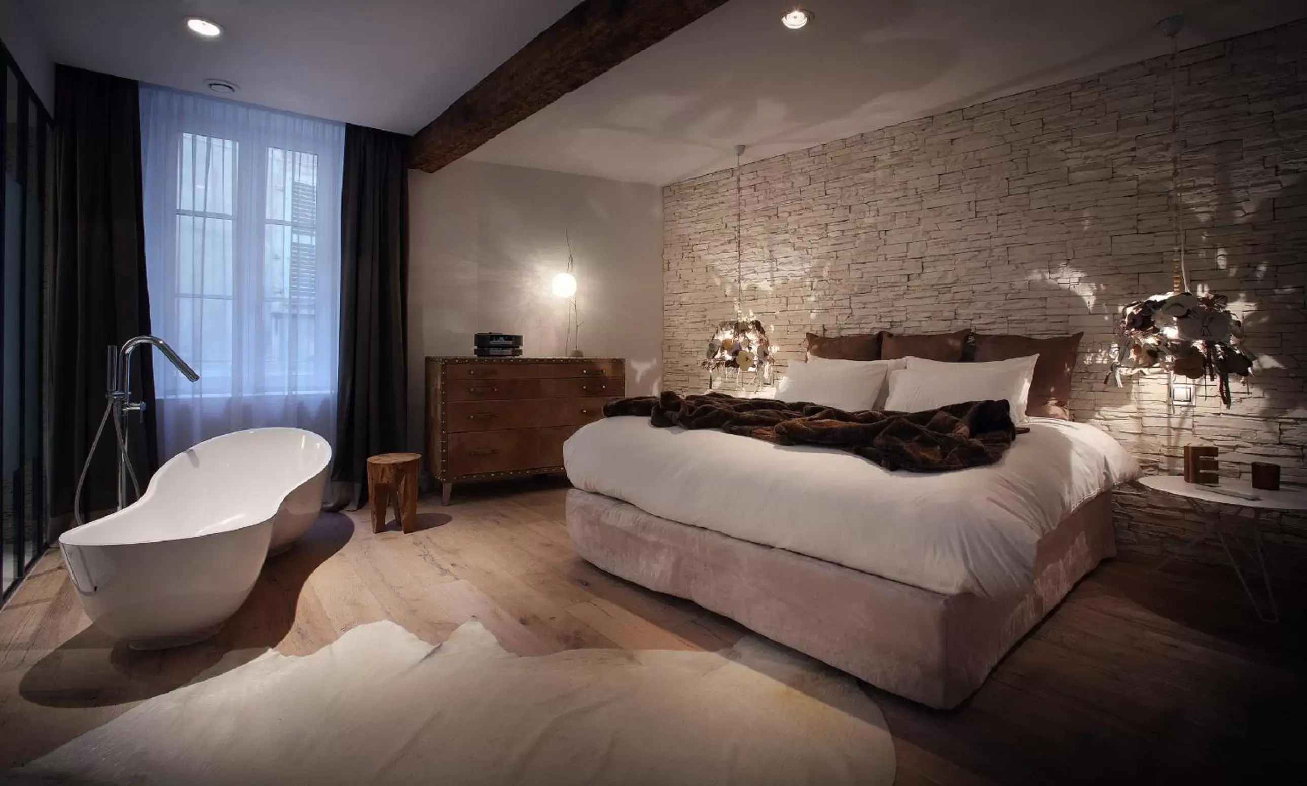 Bed in Petit Hôtel Confidentiel