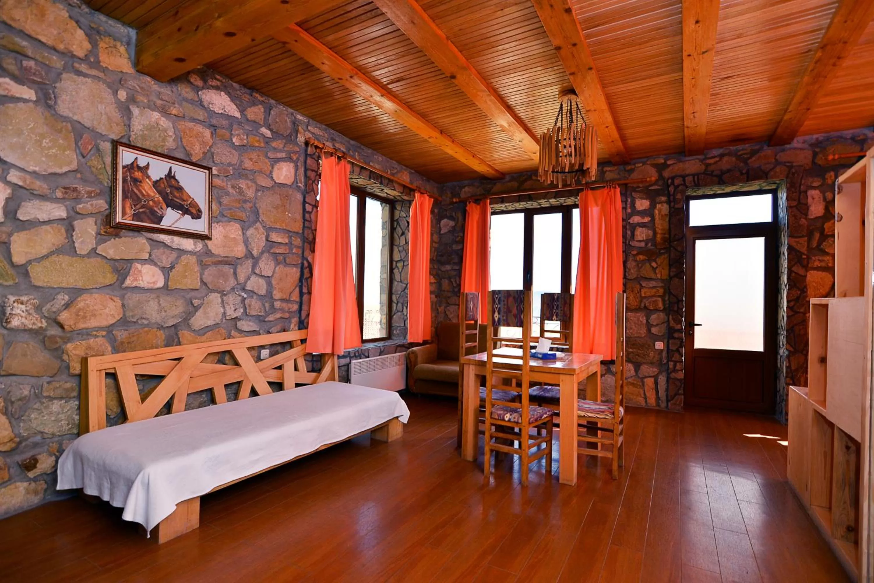 Seating area, Bed in Apaga Resort