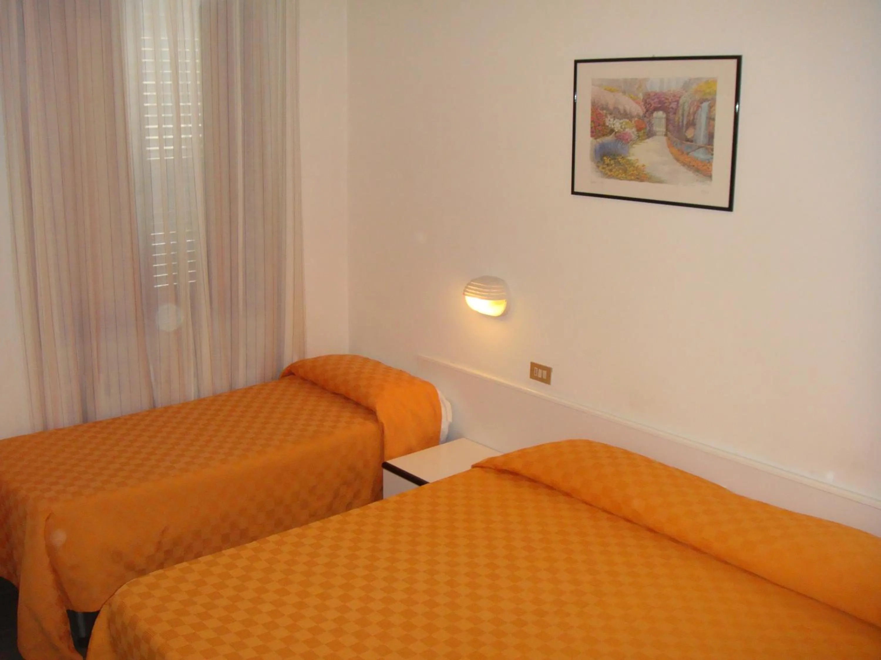 Bed in Hotel La Meridiana
