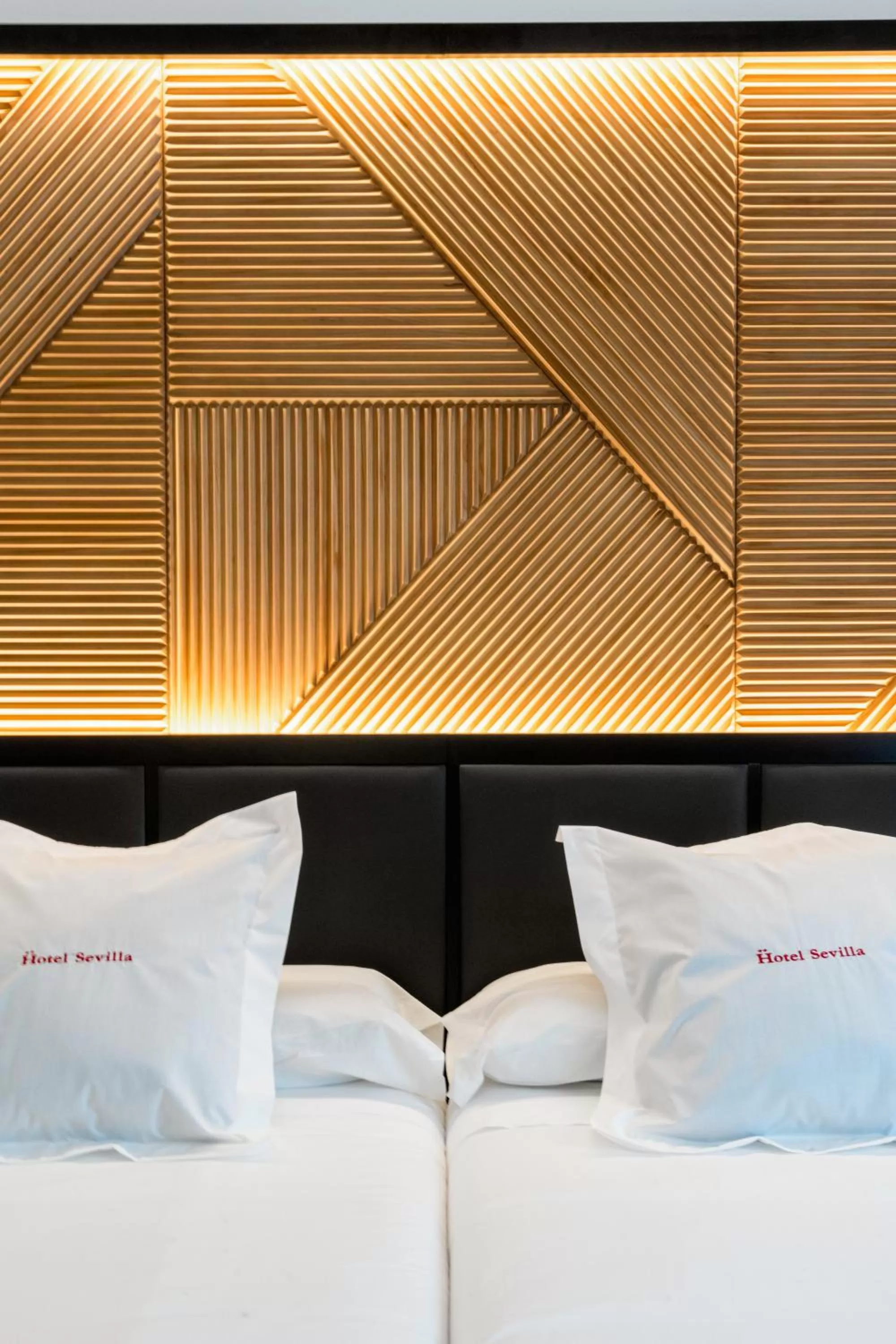 Bed in Hotel Sevilla