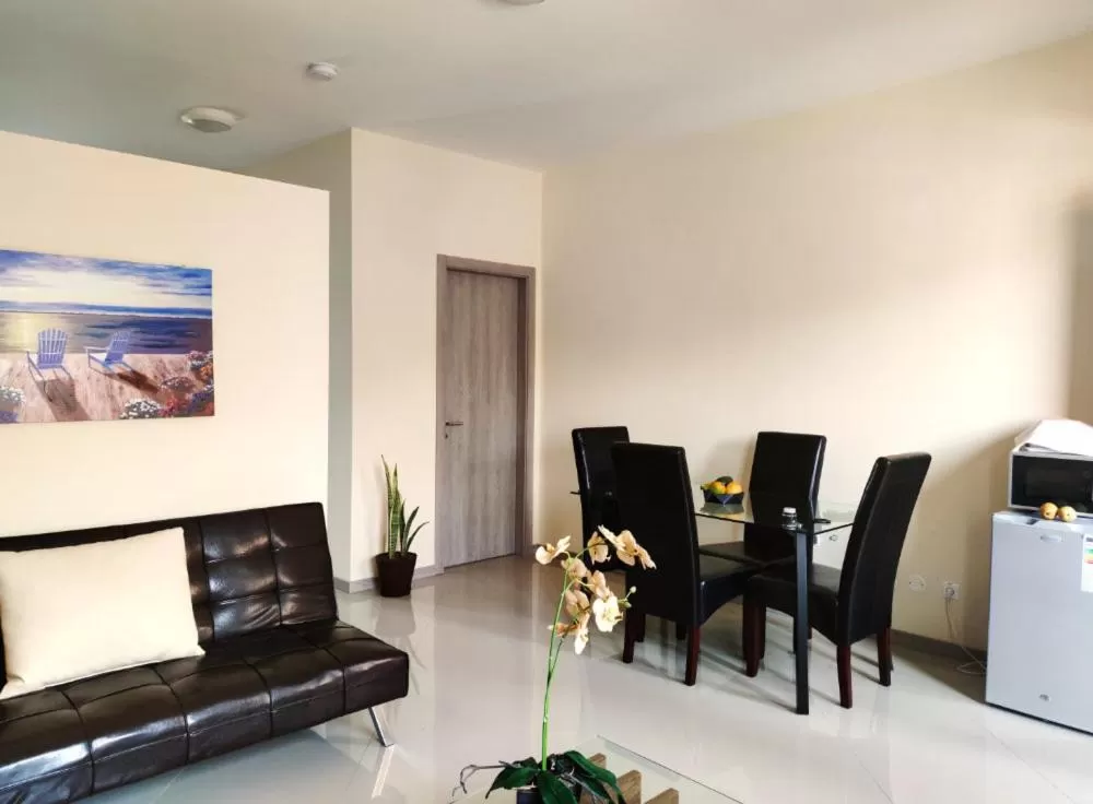 Living room, Dining Area in Praia Capital Residence