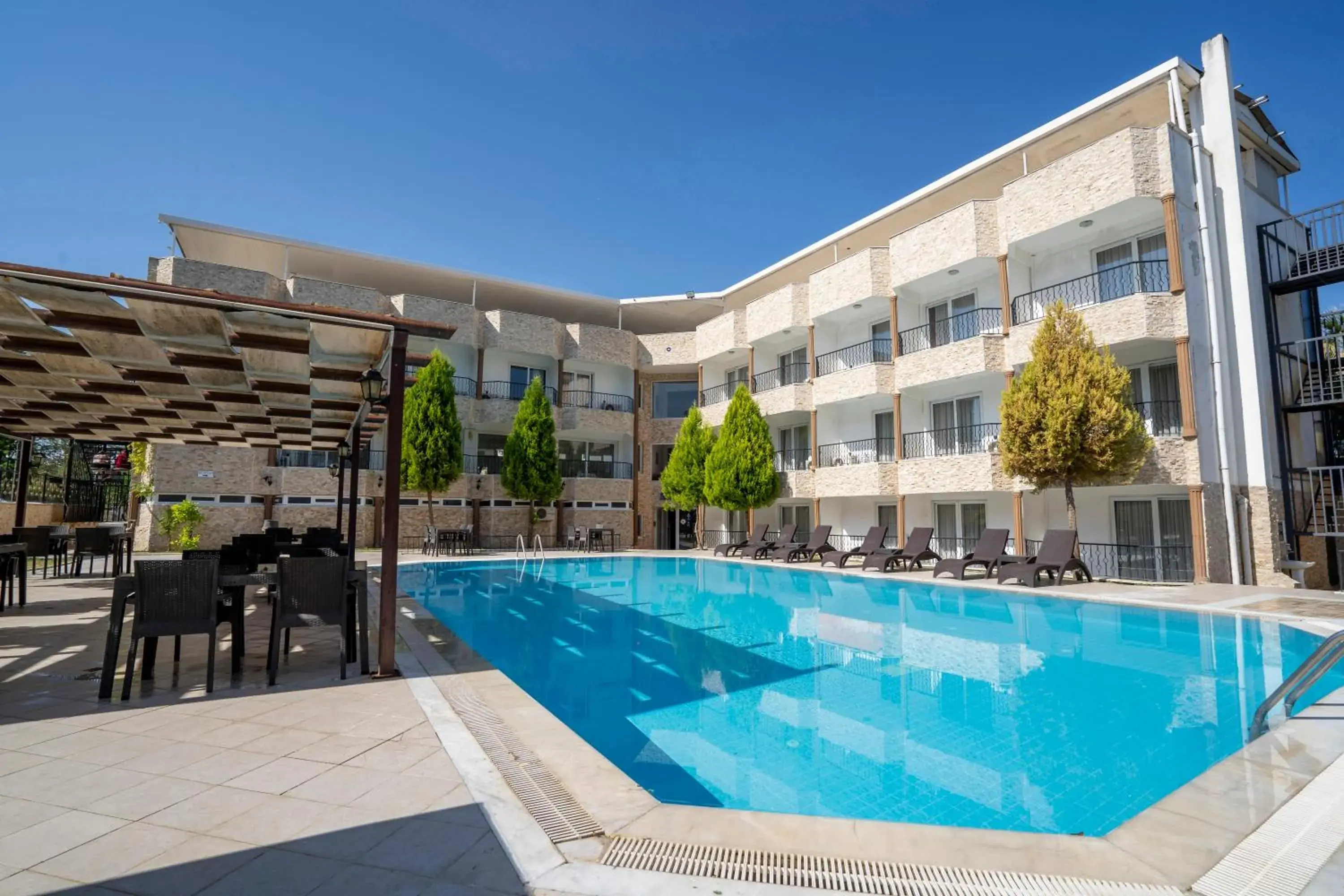 Swimming pool, Property Building in Ayapam Hotel