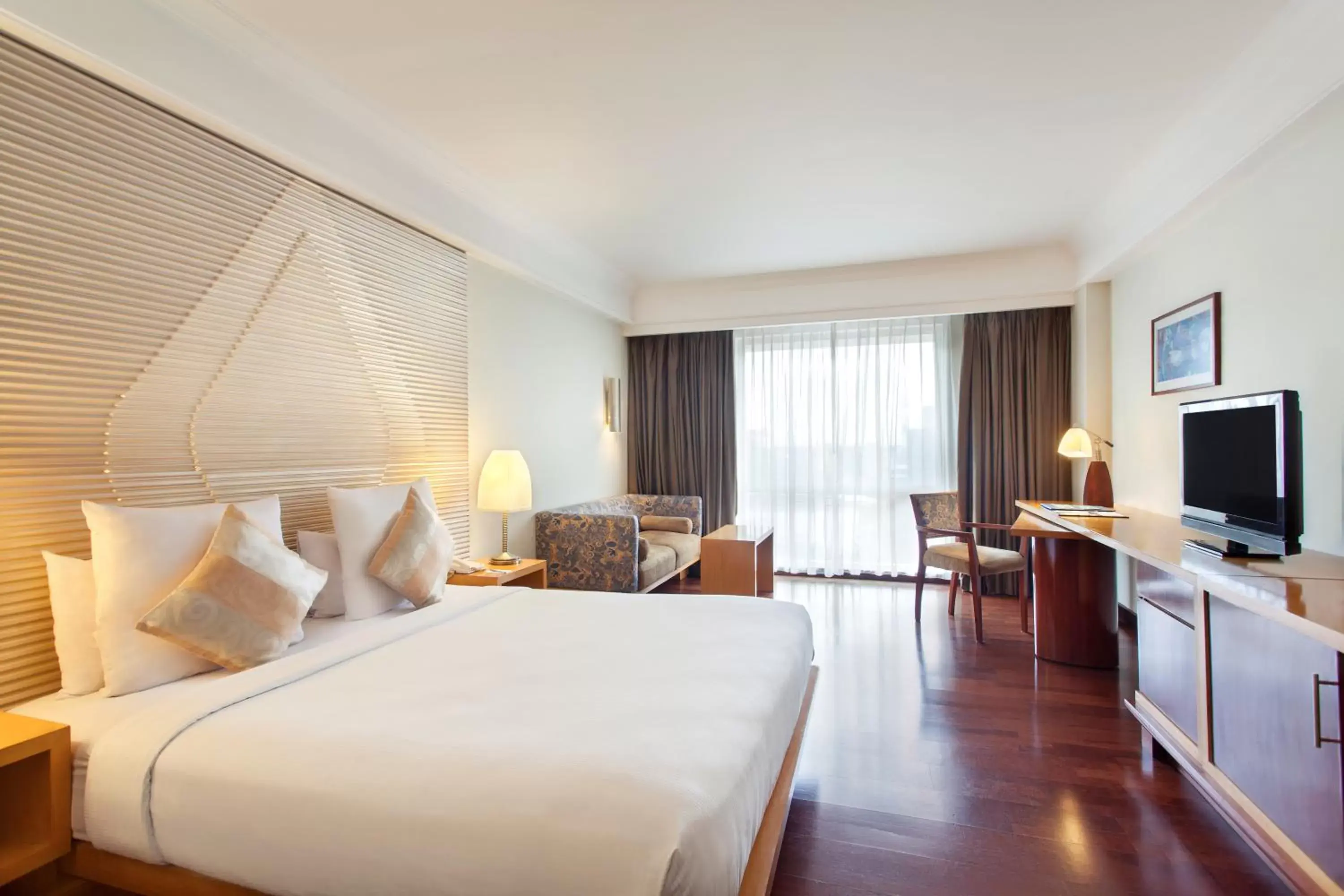 Bed in Novotel Semarang - GeNose Ready, CHSE Certified