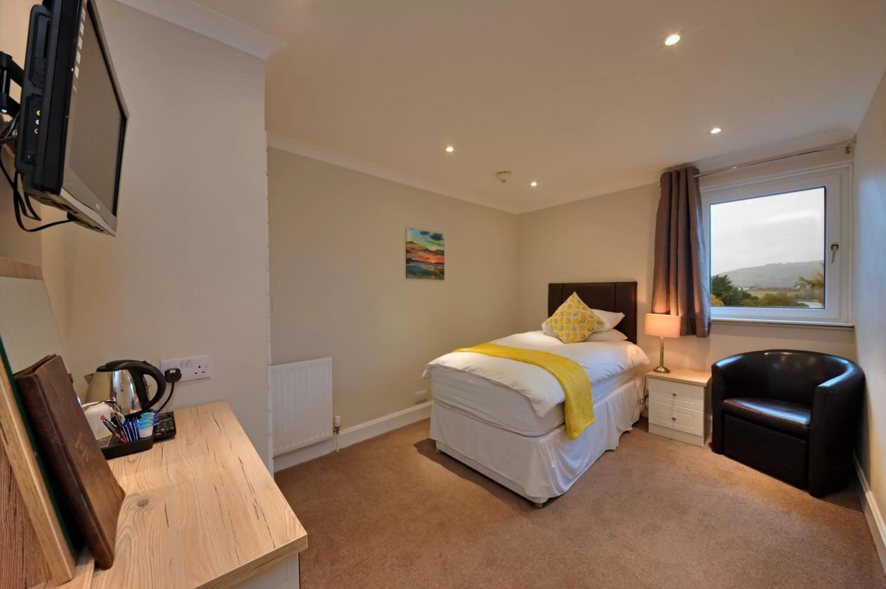 Photo of the whole room, Bed in Falls of Lora Hotel