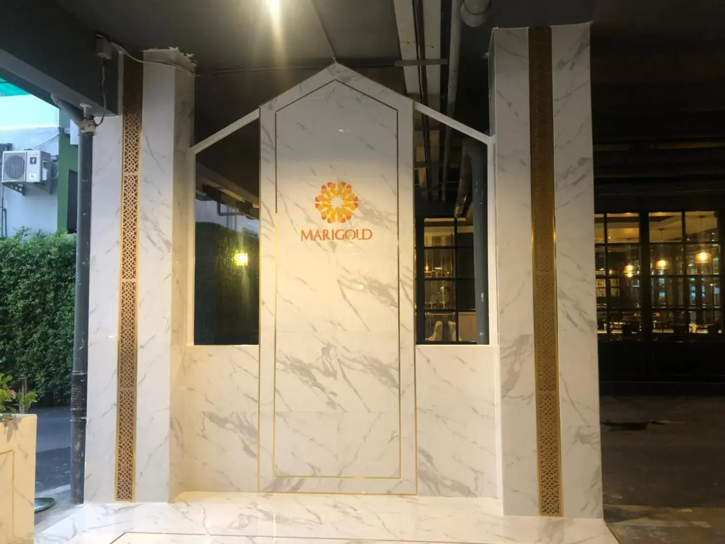 Facade/entrance in Marigold Sukhumvit - Free Shuttle to BTS Bearing Station Facade/entrance in Marigold Sukhumvit - Free Shuttle to BTS Bearing Station