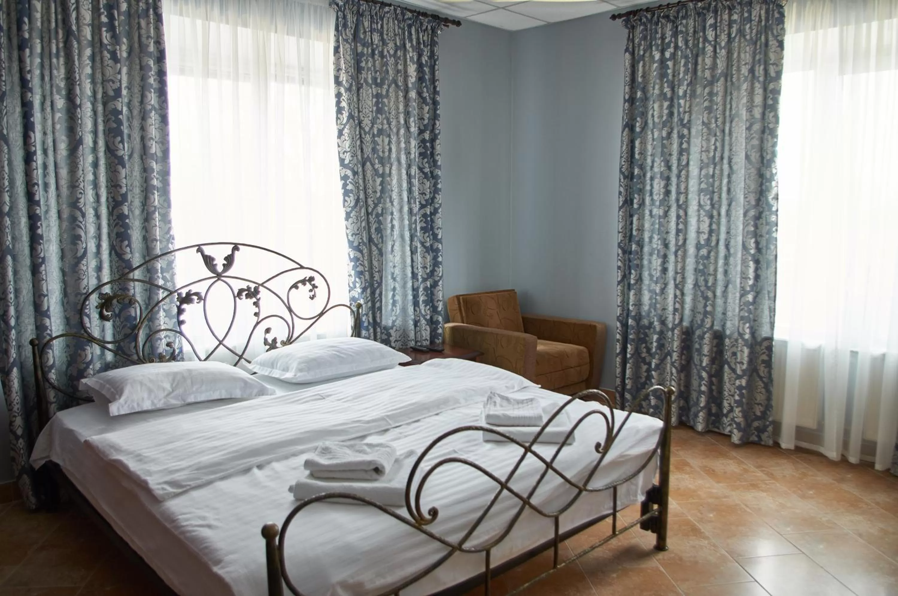 Bed in Ermitazh Hotel Complex