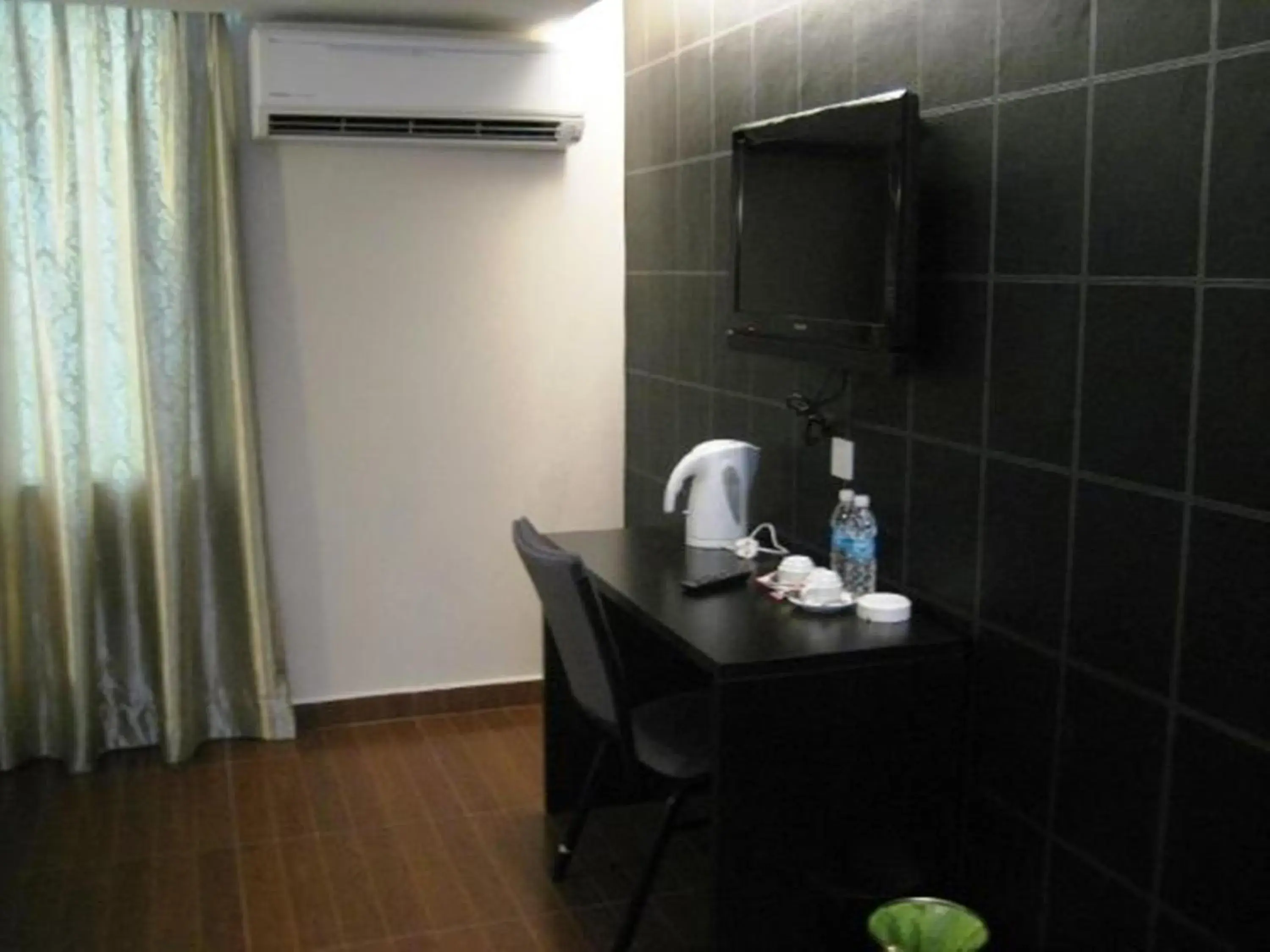 TV and multimedia, Kitchen/Kitchenette in Kk Waterfront Hotel