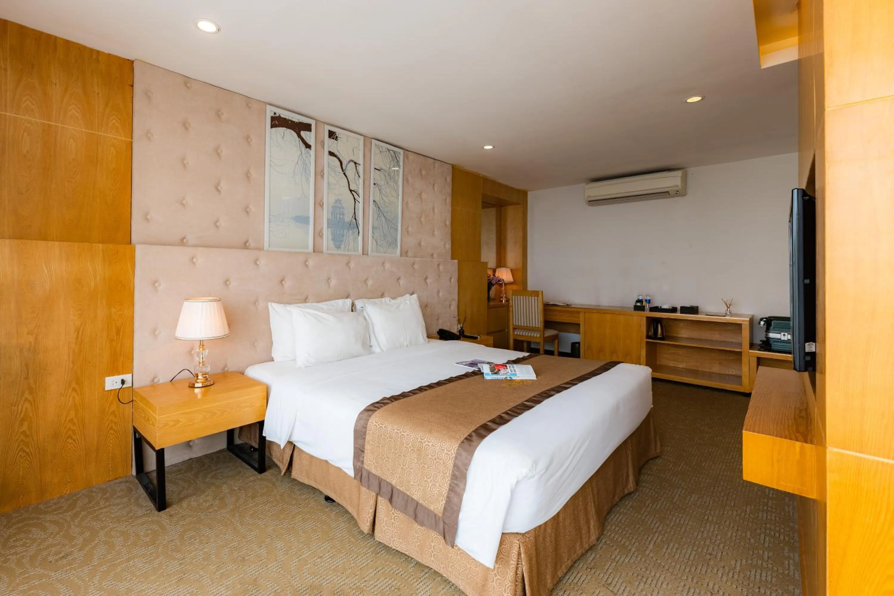 Bed in Riverside Hanoi Hotel