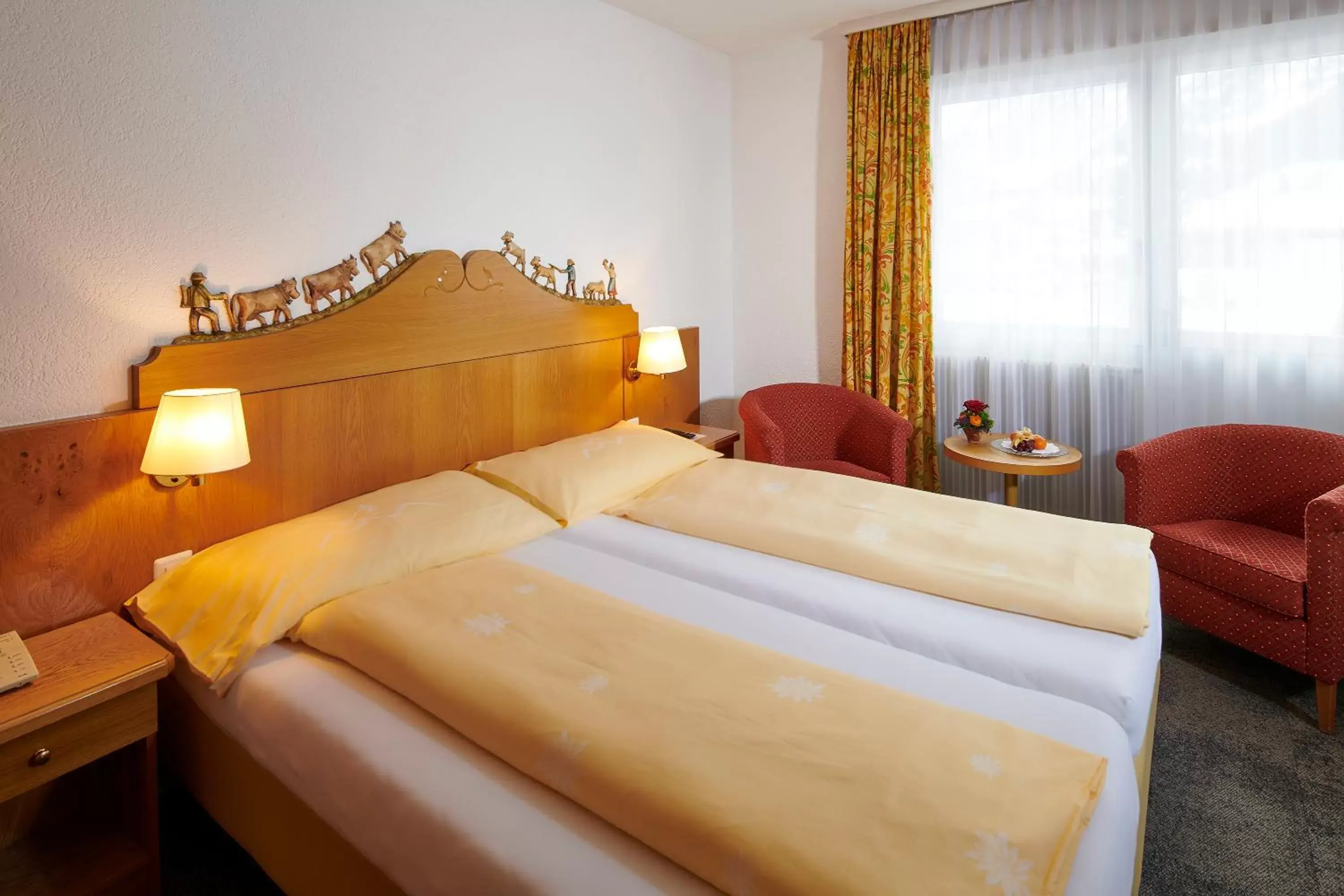 Photo of the whole room, Bed in Hotel Central Wolter - Grindelwald