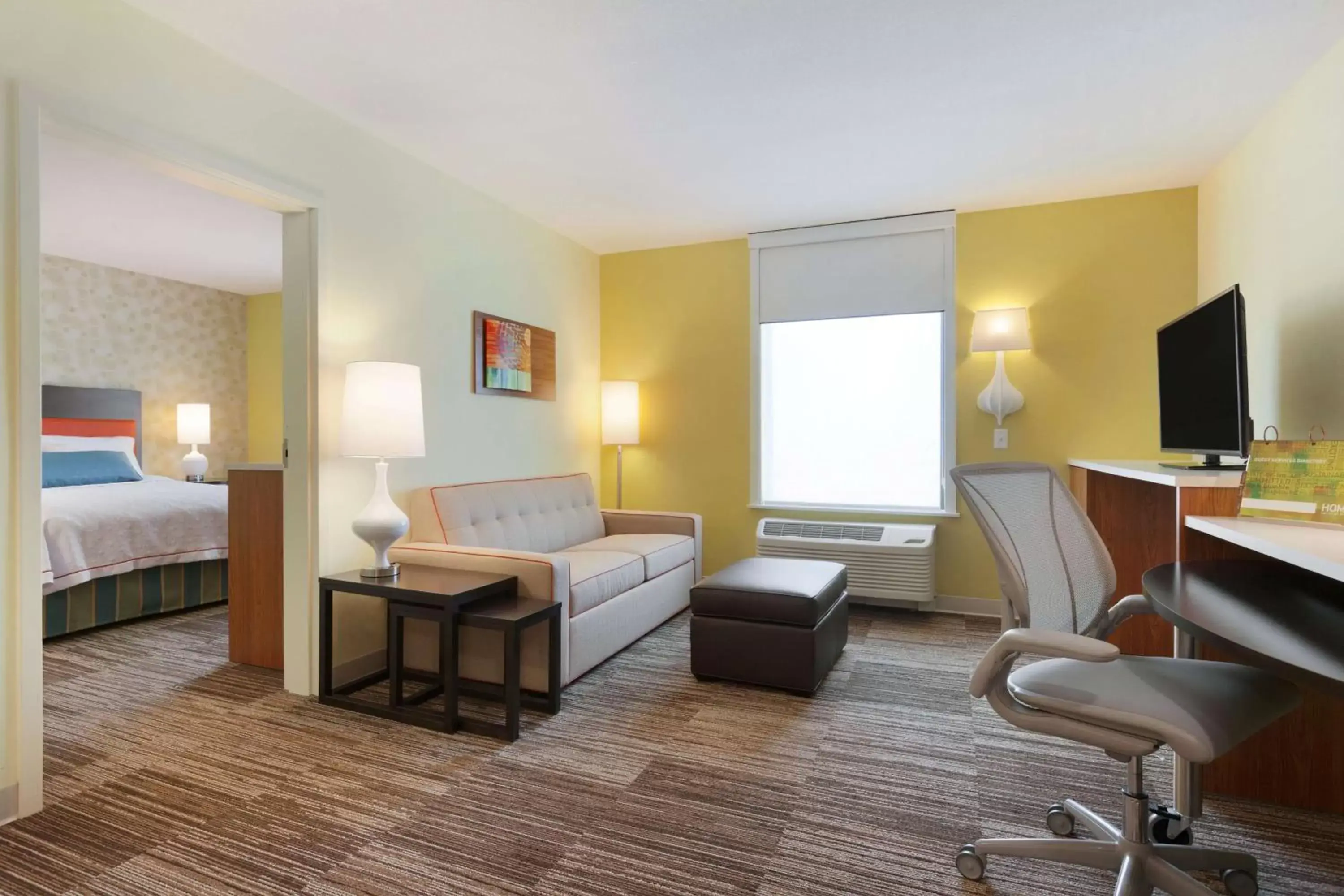 Living room, Bed in Home2 Suites by Hilton Champaign/Urbana Living room, Bed in Home2 Suites by Hilton Champaign/Urbana