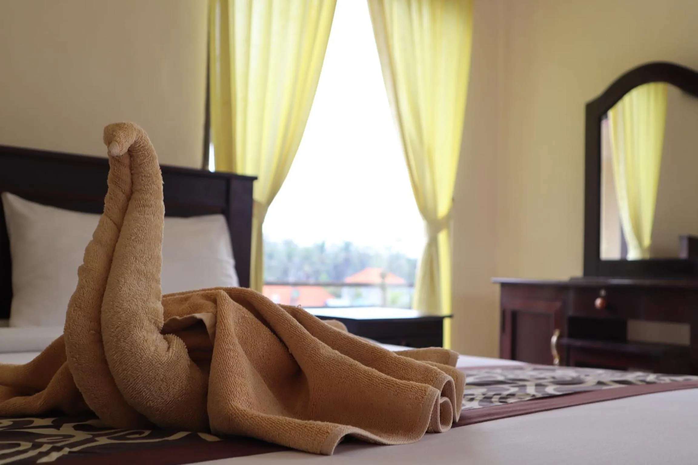 Bed in Wijaya Guest House Ubud