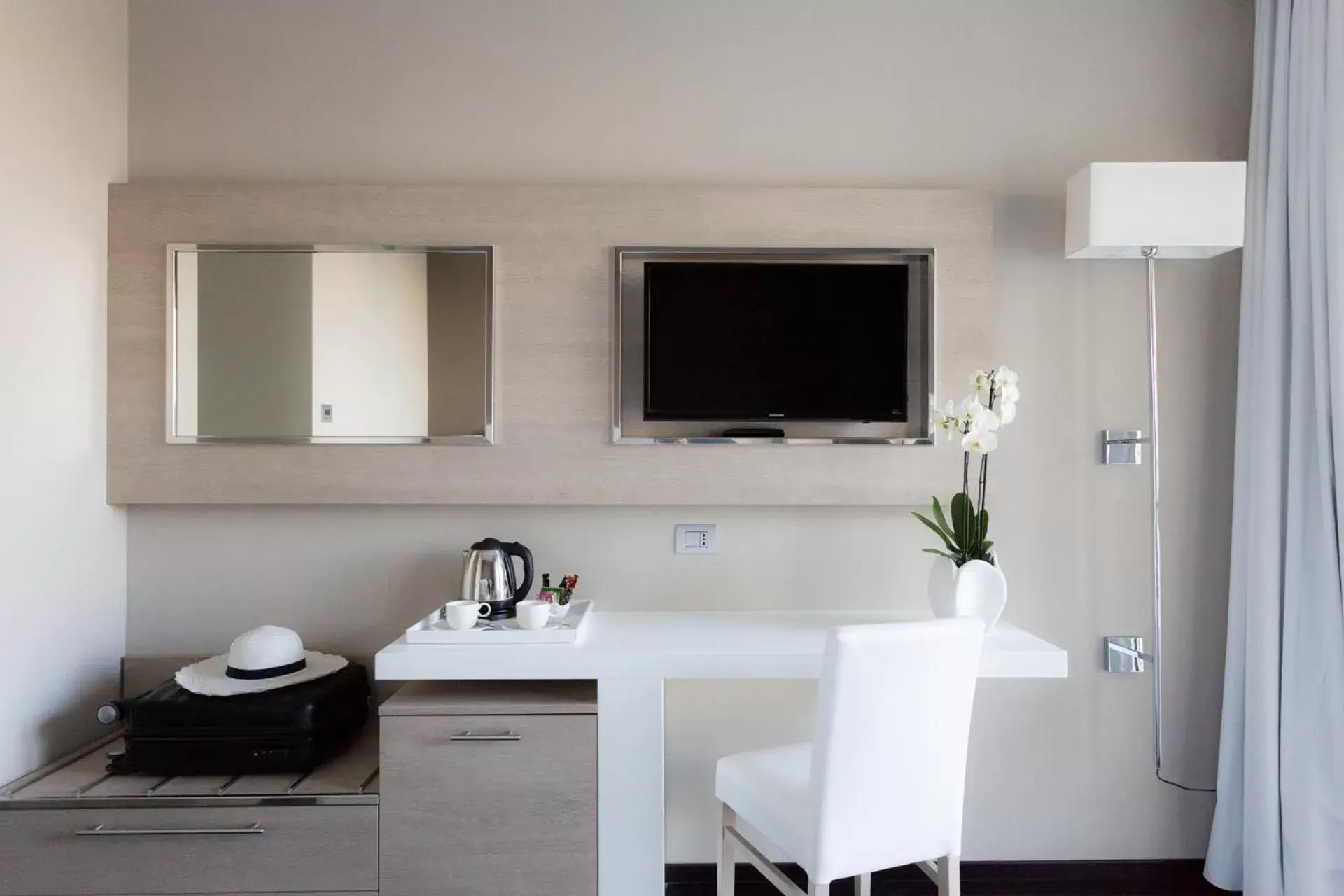 TV/Entertainment Center in Raffaello Hotel